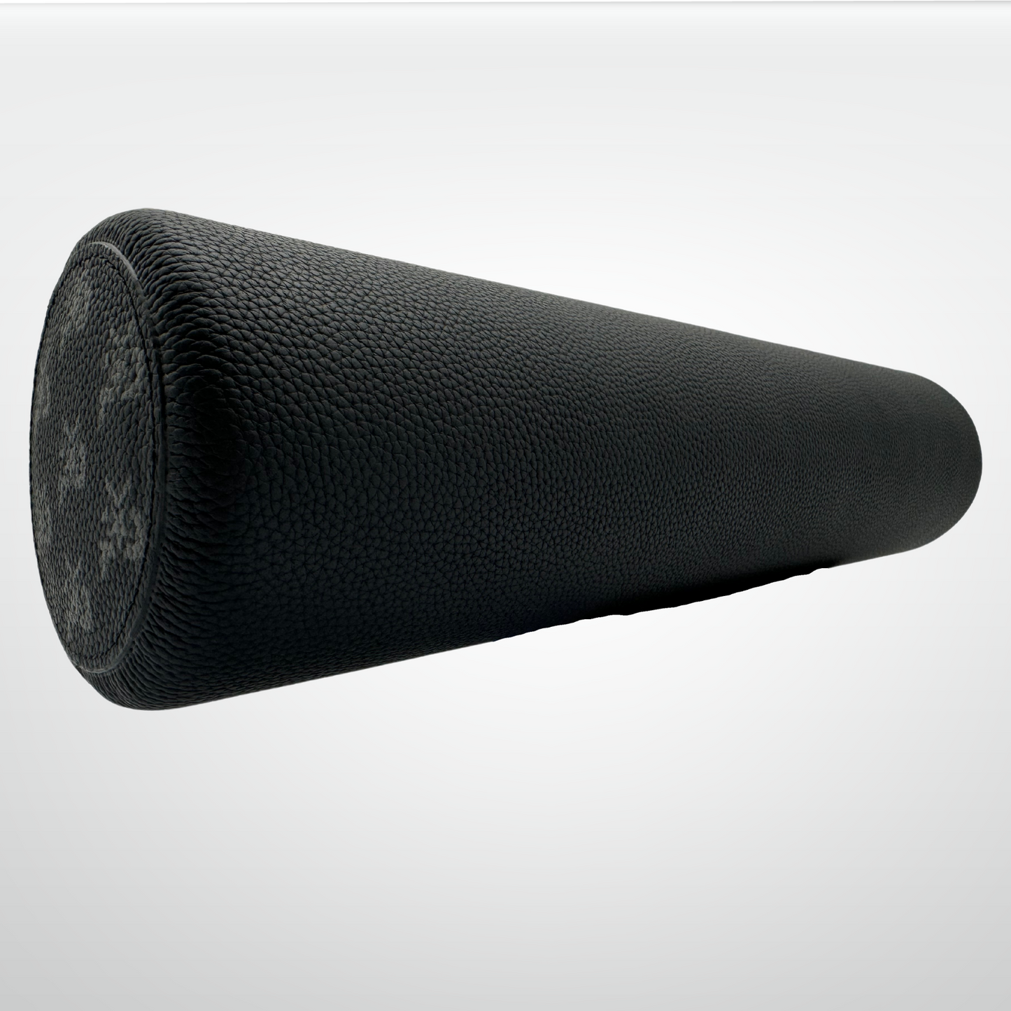 The iReliev I AM Leather-Wrapped Cork Stretching and Massage Roller is displayed on a white background, featuring a textured leather surface, dense cork core, slight taper at one end, and a circular pattern on its flat side.