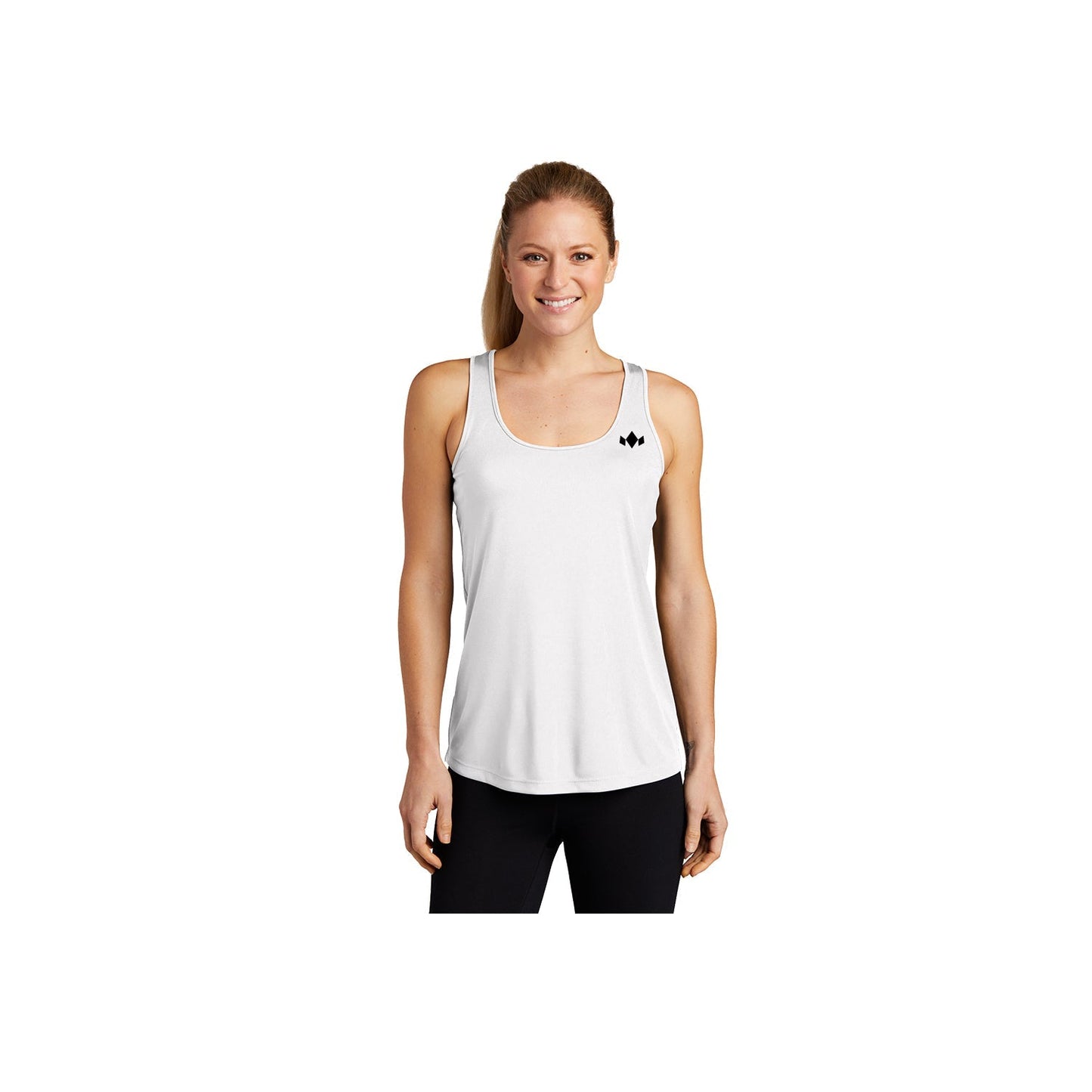 A woman with long blond hair in a ponytail smiles and faces forward, wearing the Diadem Sports Womens Essential Drycore Athletic Moisture-Wicking Training Tank in white with a small black logo on the left chest and black pants. Plain white background.