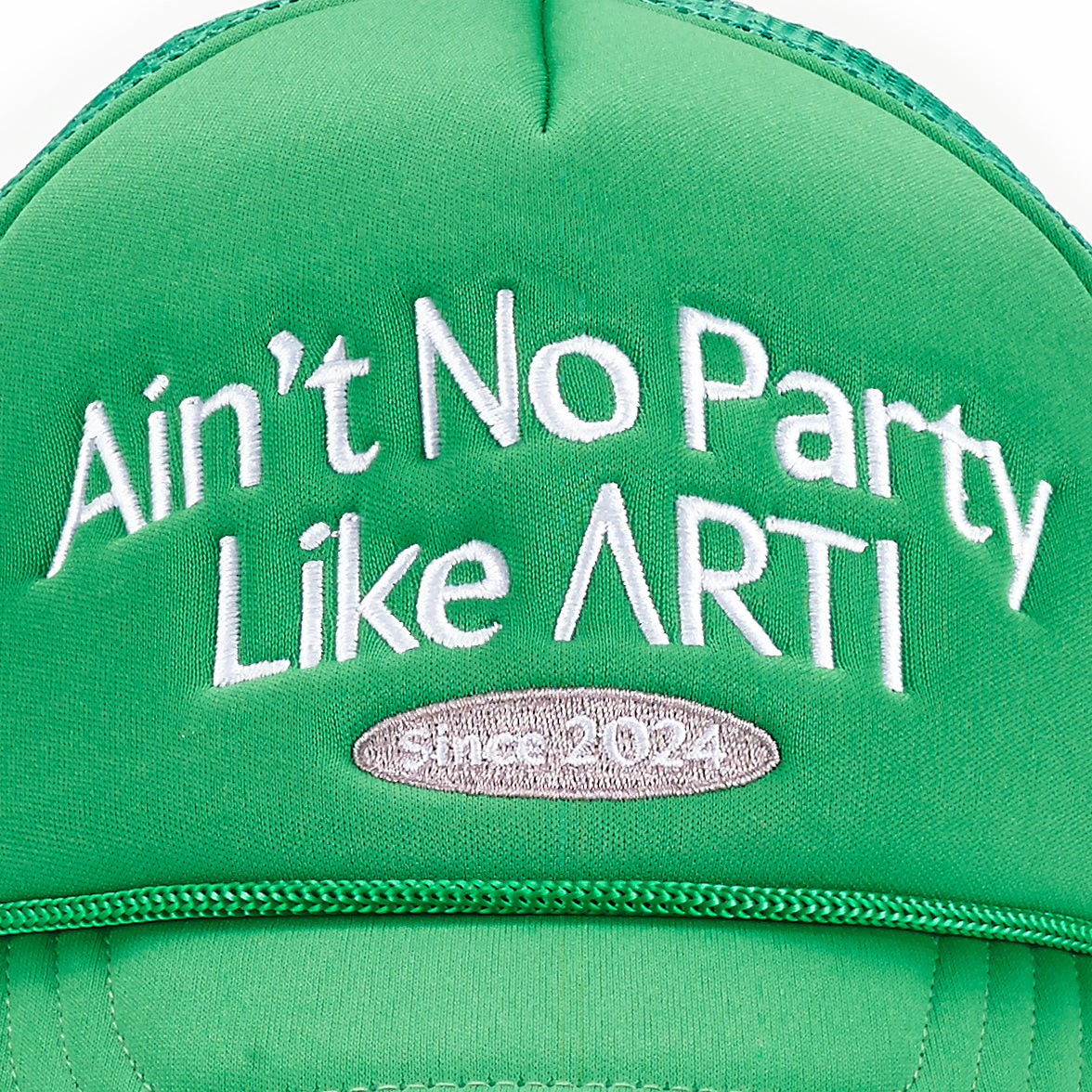 A close-up of the ARTI Ain't No Party Like ARTI Trucker Hat, featuring bright green fabric, bold white embroidered “Ain’t No Party Like ART!” text, and a gray oval patch with “SINCE 2021” in white. Playful and standout design by ARTI.