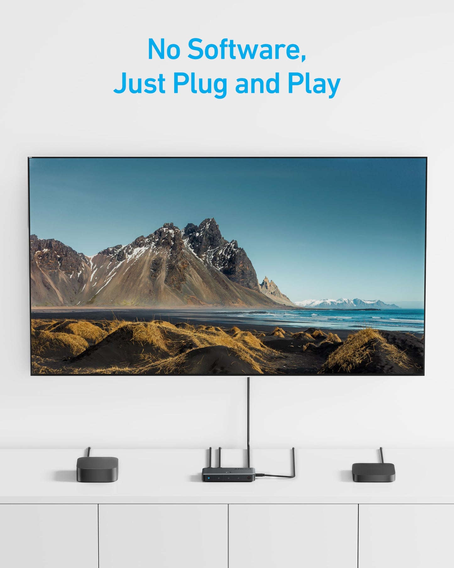 An Anker HDMI Switch (4 in 1 Out, 4K HDMI) sits on a white cabinet below a flat-screen TV displaying a scenic landscape. Three devices connect via 4K HDMI. Blue text above the TV reads: “No Software, Just Plug and Play.” Clean, minimal background.