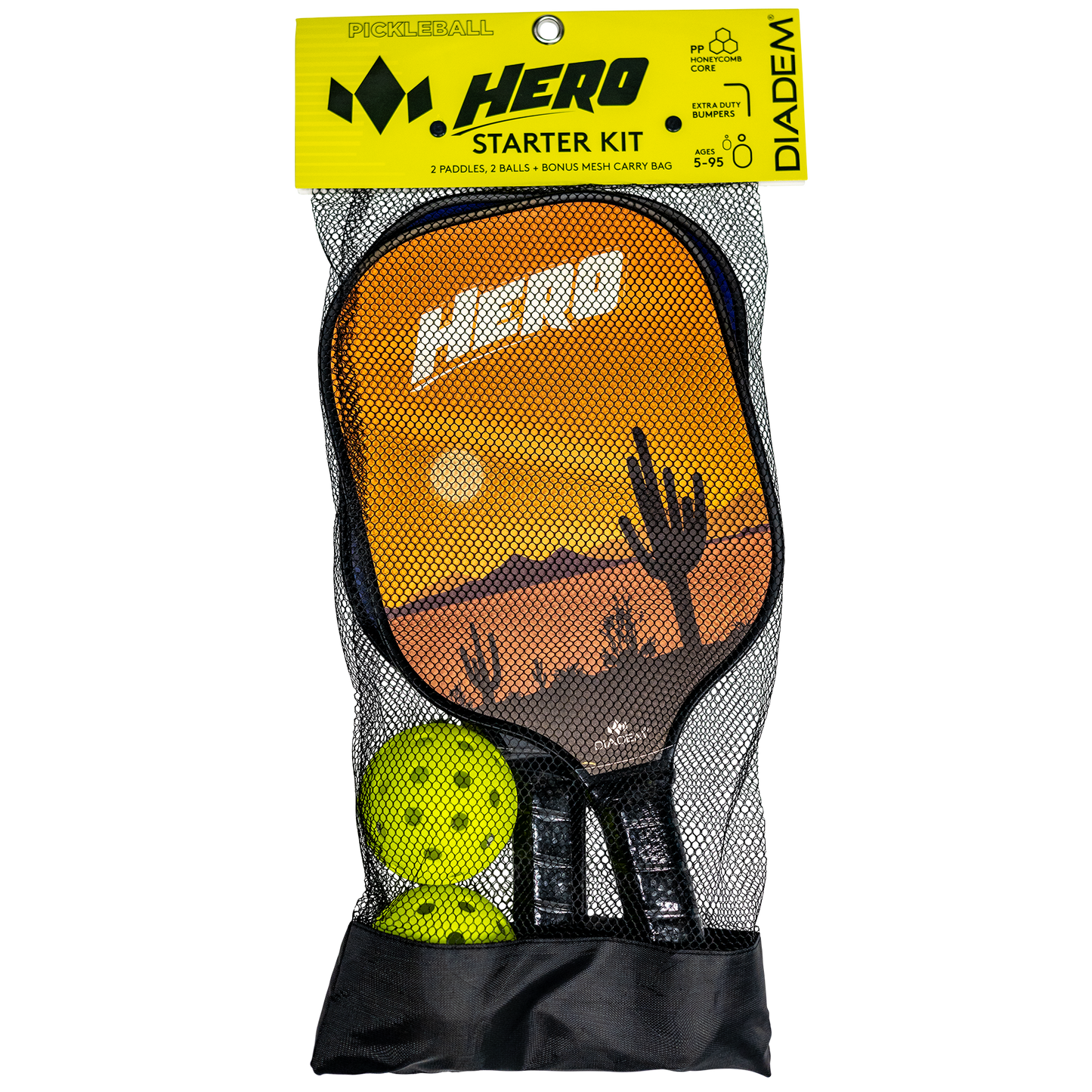 The Diadem Hero Starter Kit by Diadem Sports comes in mesh packaging and includes two paddles with a desert sunset and cacti design, two yellow perforated pickleballs, and a yellow label at the top with branding and product details.