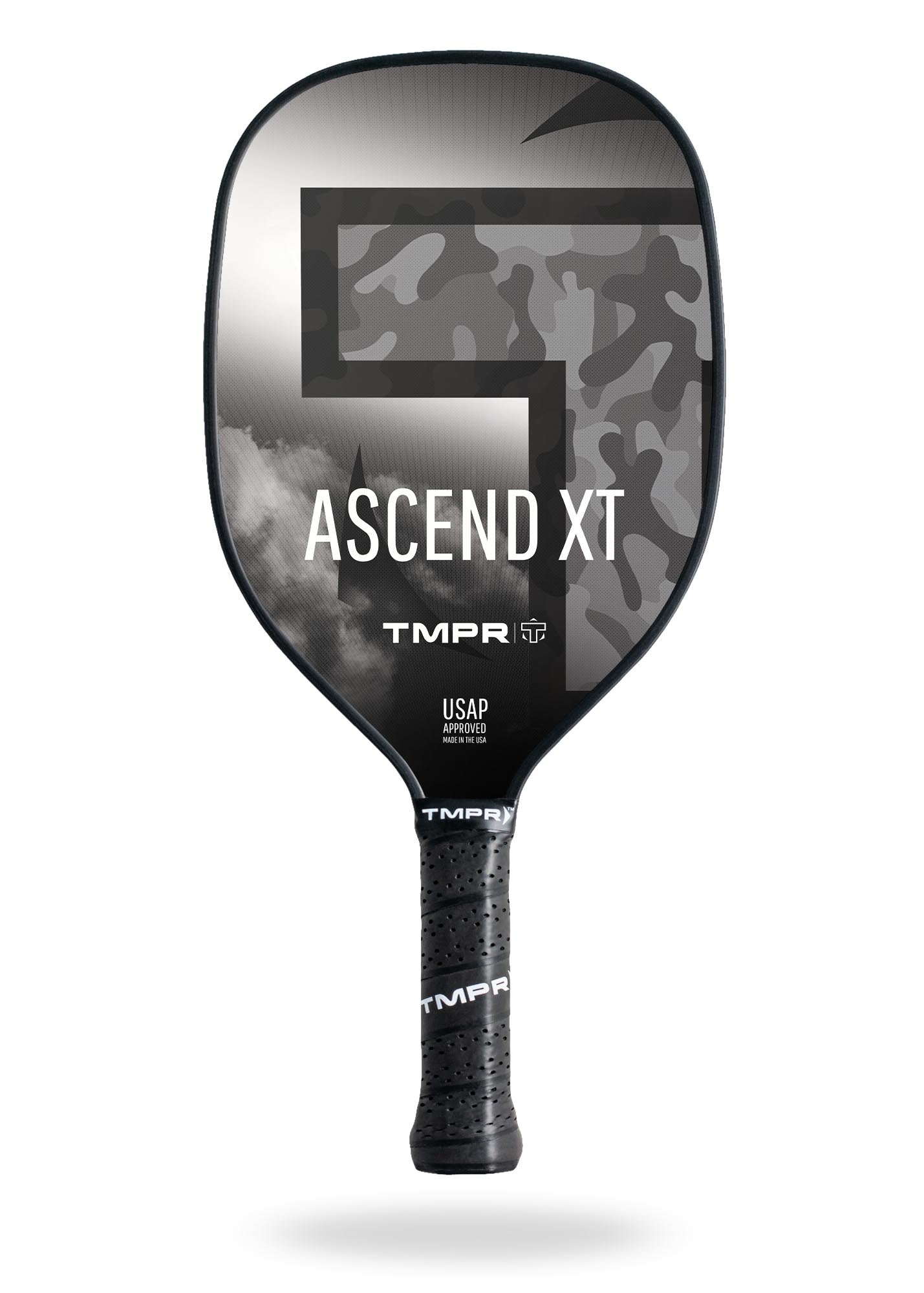 The TMPR Sports Ascend XT pickleball paddle features a black and gray design with a large camo "G", ASCEND XT, TMPR, and "USAP Approved" in white. Its textured black grip has "TMPR" printed for enhanced vibration dampening.