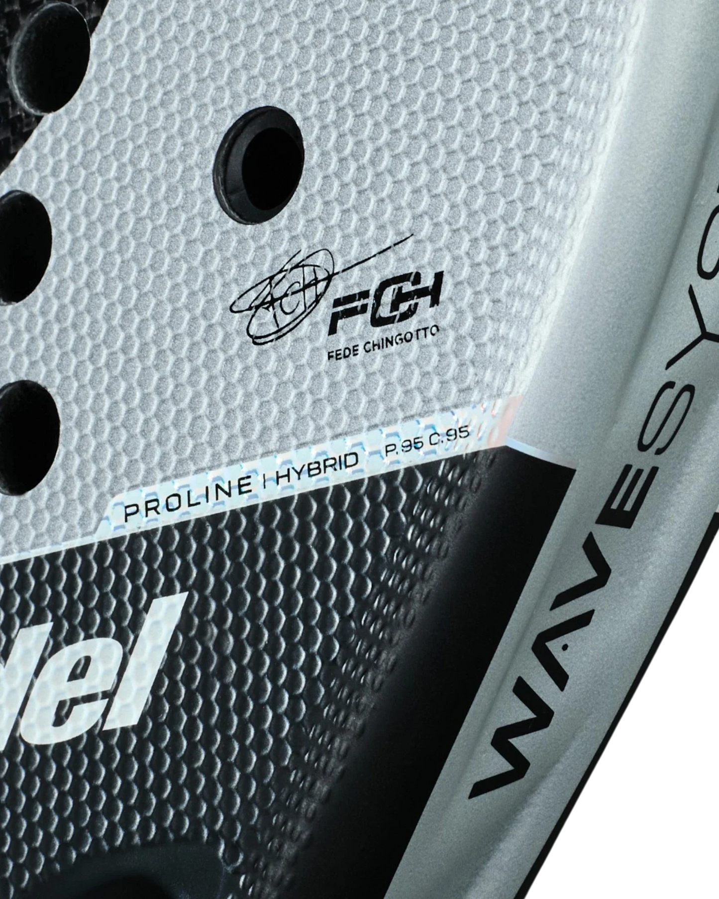 Close-up of the black and white Bullpadel Neuron padel racket from Padel USA, featuring a textured, perforated surface. Visible details include PROLINE HYBRID, F. CHINGotto with signature, and part of "WAVESYSTEM" in a modern design.