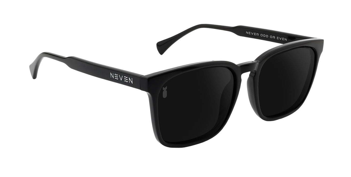 The Rufus sunglasses from Neven Eyewear’s Divebomb Collection feature black rectangular polarized frames with dark lenses. “NEVEN” is in white on the left temple, and “NEVER ODD OR EVEN” appears on the right, inspired by Phil Sgrosso.