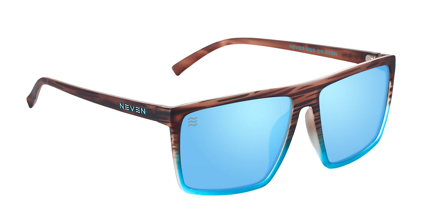 Melby XL by Neven Eyewear: rectangular polarized sunglasses with blue mirrored lenses and a large, brown wood-textured frame. "NEVEN" is in white on the left temple, "ODD OR EVEN" inside right arm, featuring a modern angular design.