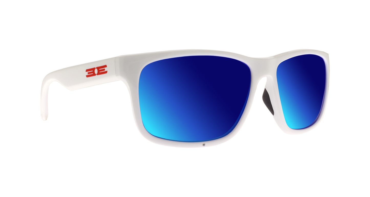 Epoch Eyewear Delta sunglasses feature a white frame, vibrant blue mirrored lenses, and a red stylized EE logo on the left arm. Lightweight with a modern sporty look, they’re shown against a plain white background.