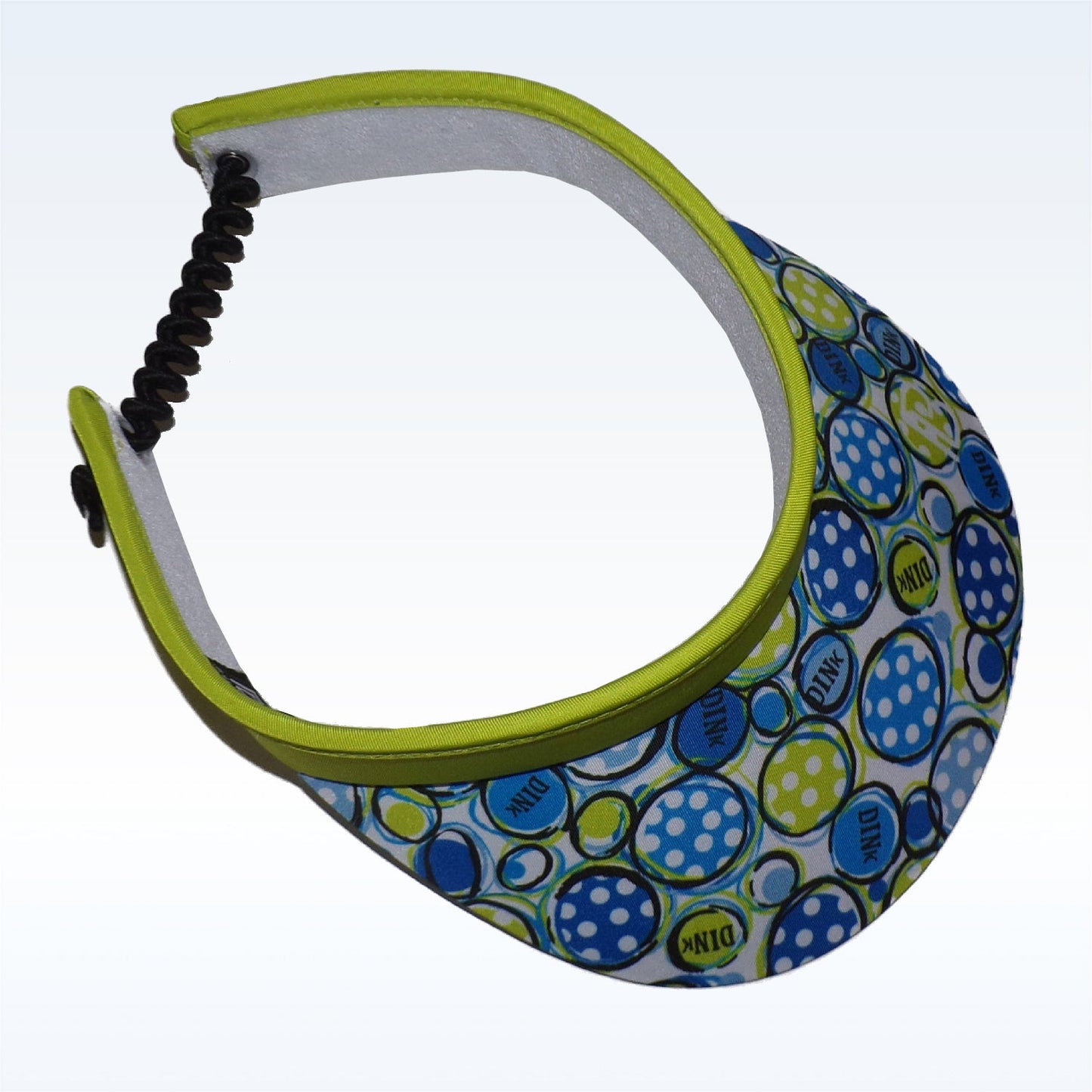 The PB Visor Dink 1 by Pickleball Bella features a hard bill visor with blue, green, and yellow polka dot circles labeled DIVN, a lime green trim, elastic back, and a moisture-wicking headband for comfort and quick drying.