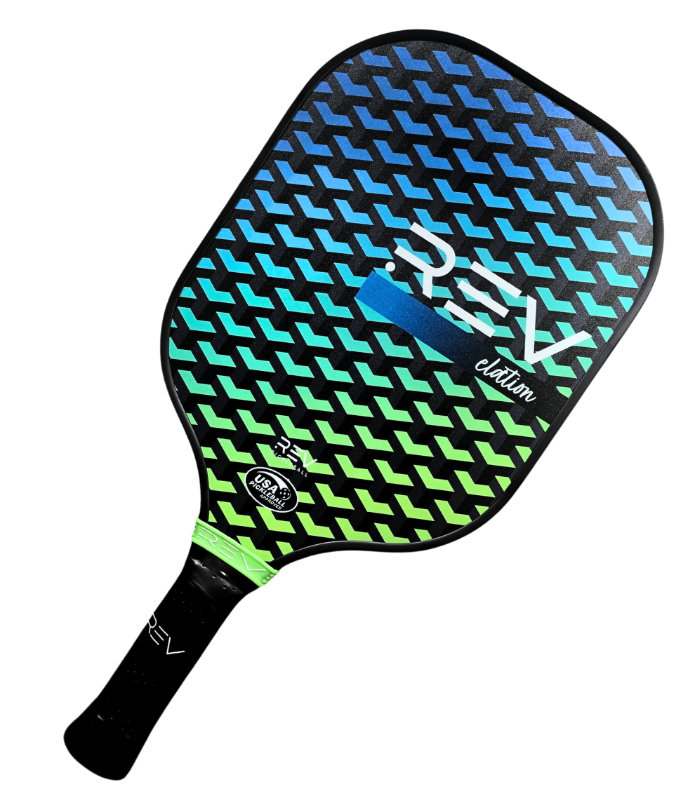 The REV Pickleball ELATION paddle features USAPA approval, a black handle, and a blue, green, and black patterned fiberglass face with diagonal chevrons, plus "REV elation" and logo near the base.