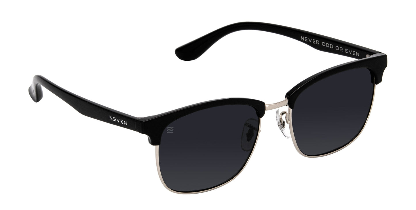 The Bullet by Neven Eyewear are black TR90-framed polarized sunglasses with dark lenses, metallic accents on the bottom edge and bridge, “NEVER ODD OR EVEN” inscribed inside the arm, and “NEVEN” by the hinge.