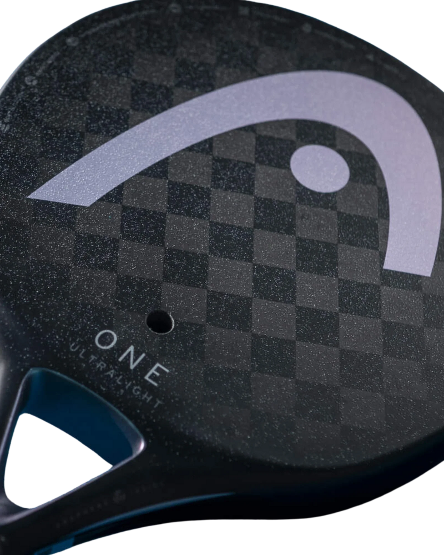 Close-up of the Head One Ultralight Black by Padel USA, a black paddle with subtle checkerboard texture and bold light purple logo. Features a smooth 12K carbon surface marked "ONE" and "ULTRA LIGHT" in white near the handle.