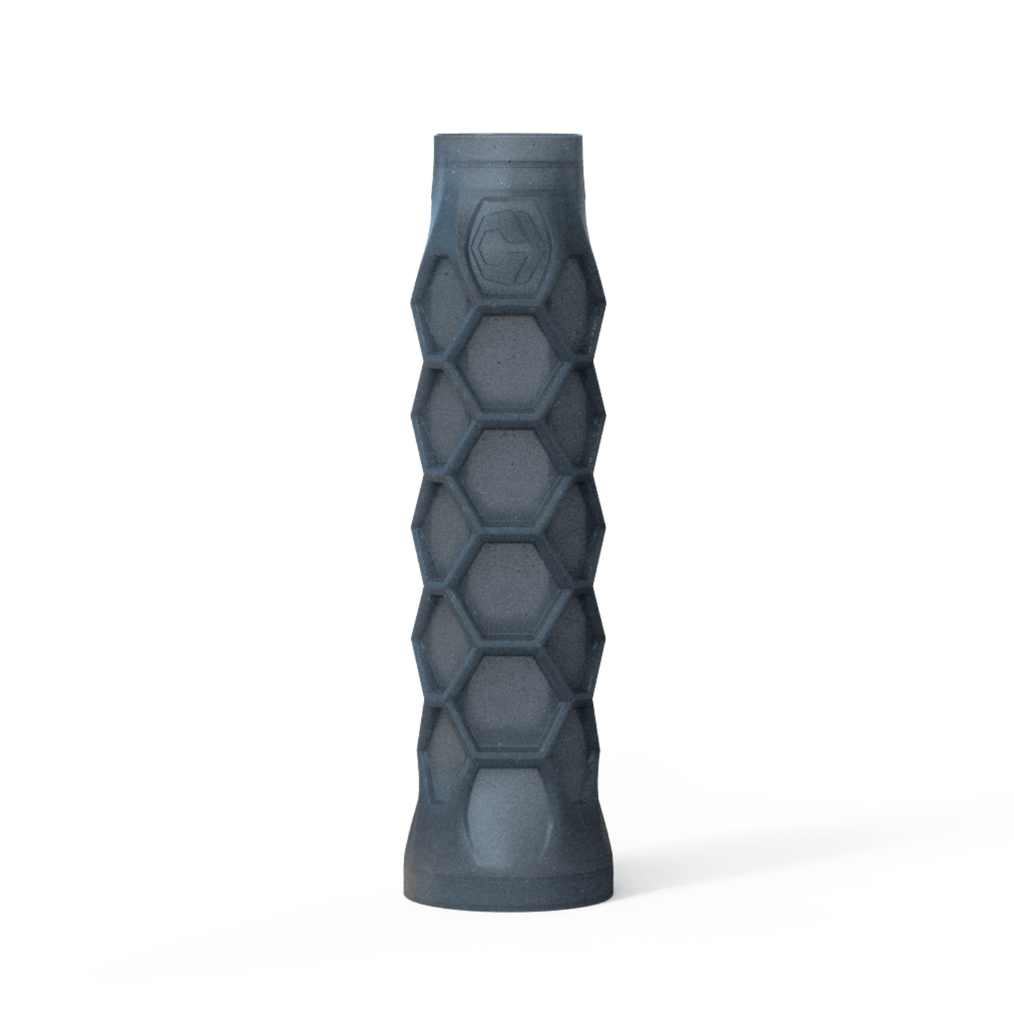 A dark gray, cylindrical Hesacore Grip Pickleball Carbon Grip (5.25" long, stiff feel, charcoal) features a hexagonal honeycomb pattern, ergonomic anti-vibration design, and an embossed hexagon logo near its narrower top on a white background.