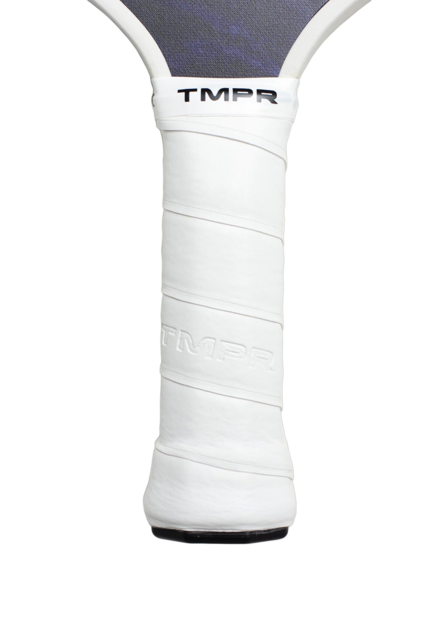 Close-up of a white Ascend LX | Indigo Ice pickleball paddle handle by TMPR Sports, featuring the black TMPR logo near the top. The long handle is neatly wrapped with textured white grip tape in a spiral pattern; lower paddle face partially visible.