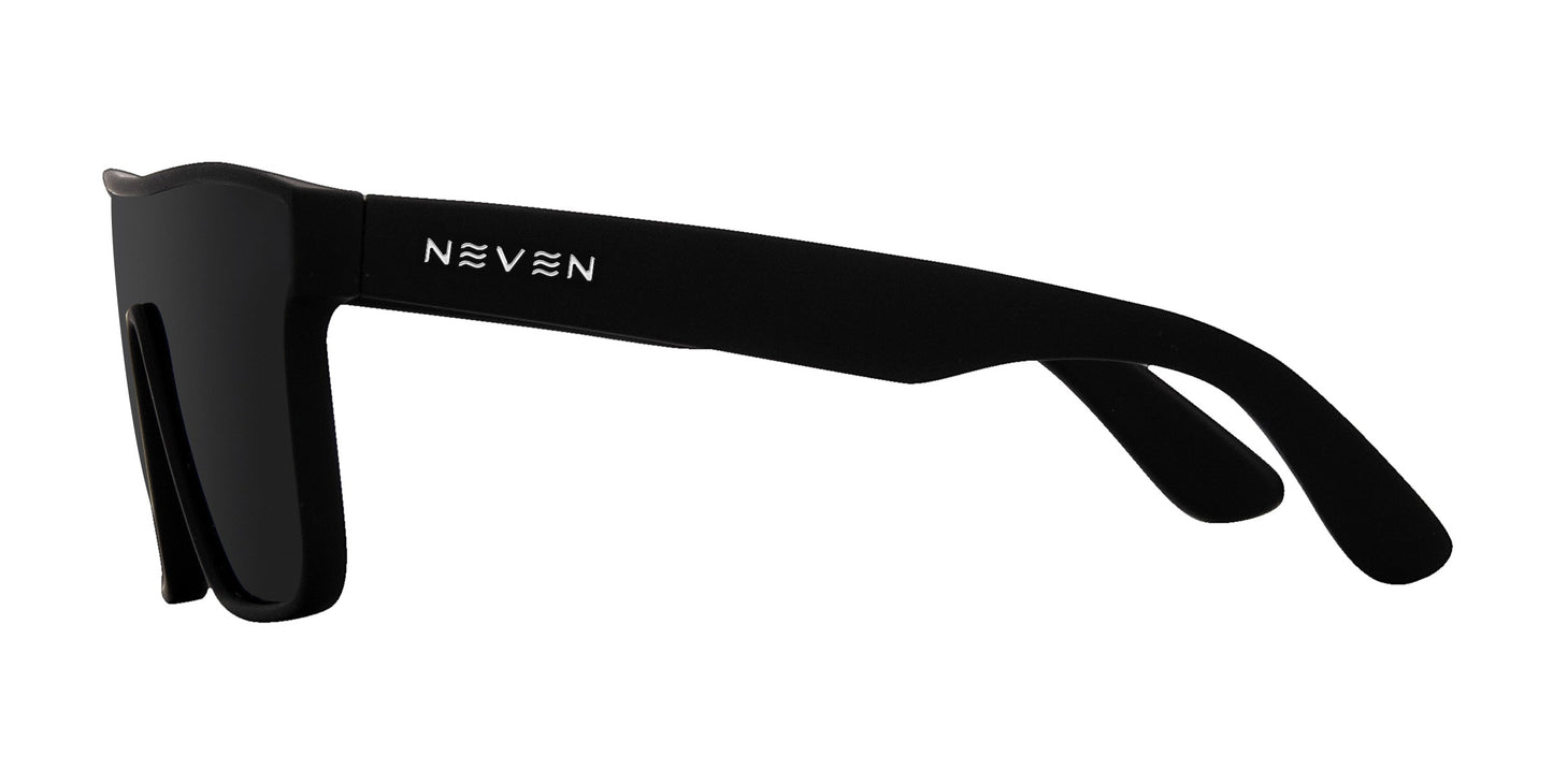 Side view of the Bold XL by Neven Eyewear: matte black oversized sunglasses with thick frames and temples, white Neven logo on the temple, and dark rectangular polarized lenses for UV protection and a modern minimalist style.