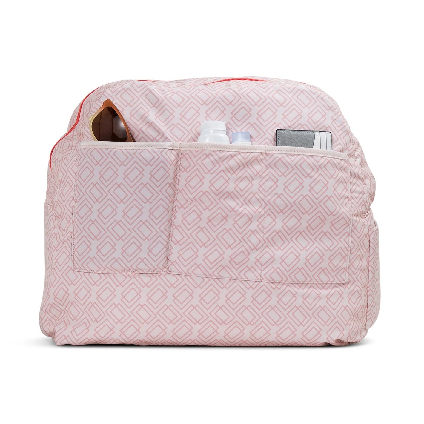 The Doubletake LONDON Pickleball Duffel & Tote in pink geometric print offers ample storage, an open top, and a front pocket displaying a bottle and smartphone. The bag is set against a plain white background.
