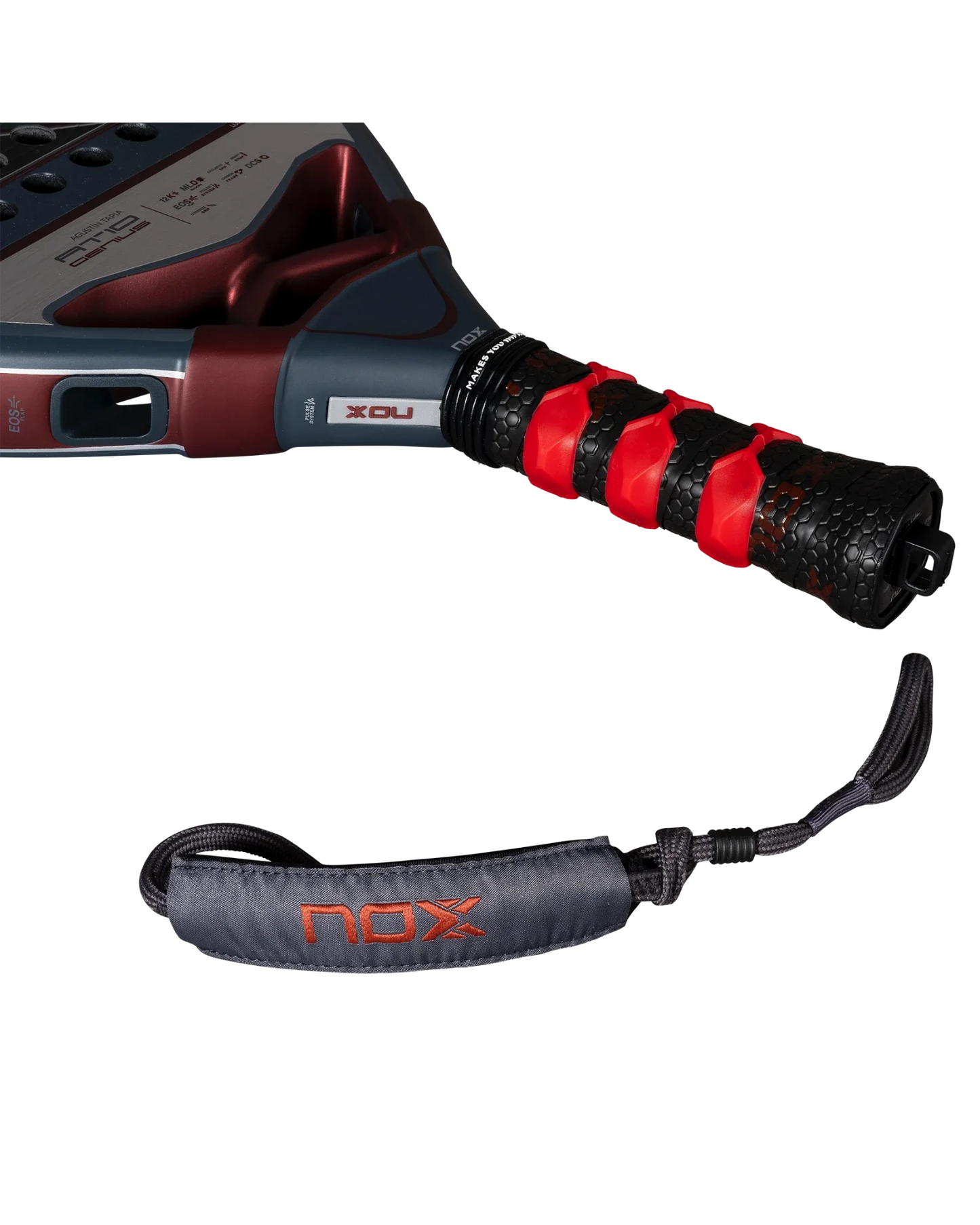 Close-up of the Nox AT10 Luxury GENIUS 12K 2025 by Agustin Tapia from Padel USA, showing a black grip with red accents, 12K carbon fiber build, and a detachable black wrist strap embroidered with "NOX" in orange on a white background.