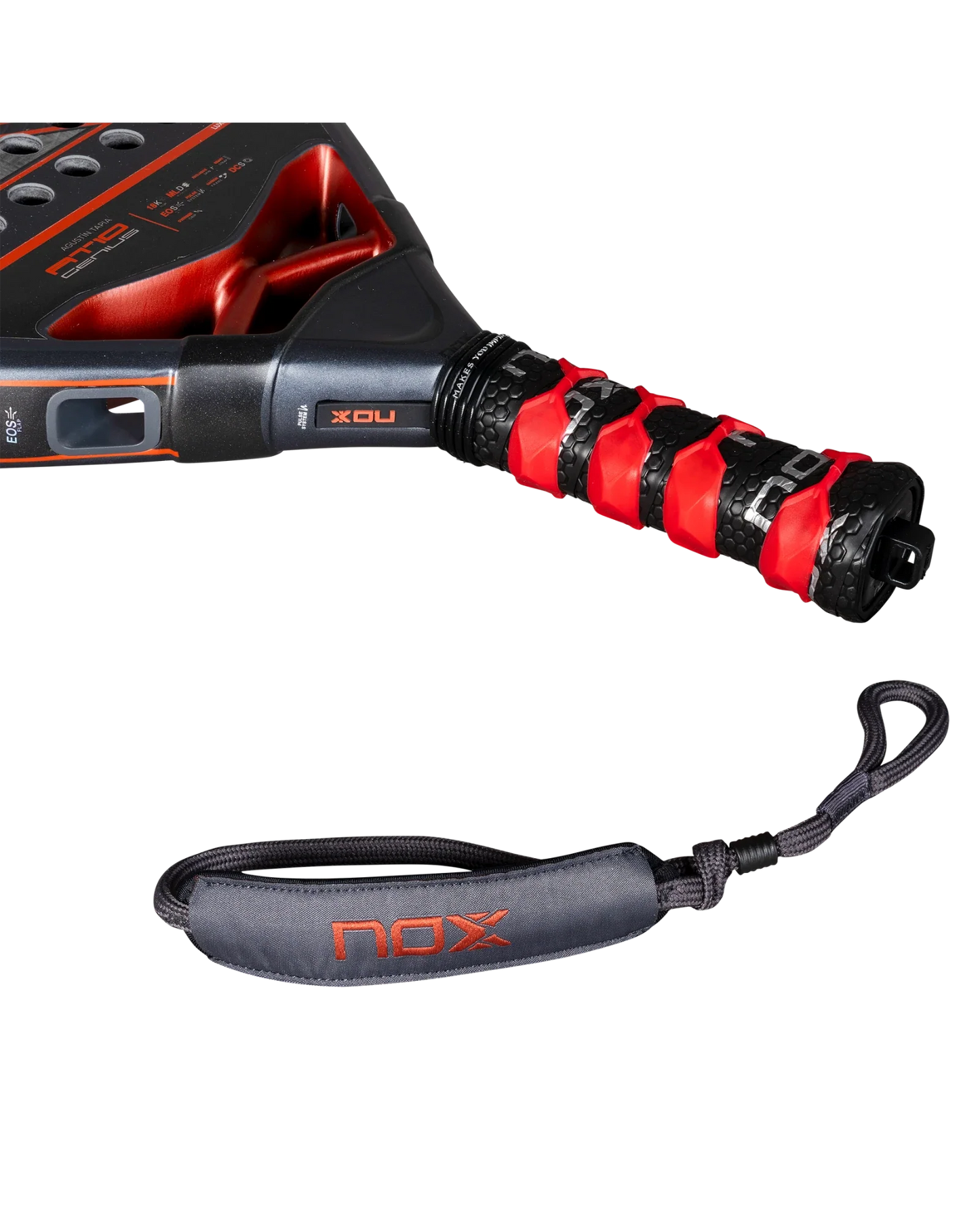 A close-up of the Nox AT10 Luxury GENIUS 18K Alum by Agustín Tapia from Padel USA shows its handle wrapped in black and red grip tape, with a detachable black and gray wrist strap featuring the orange NOX logo, set on a plain white background.