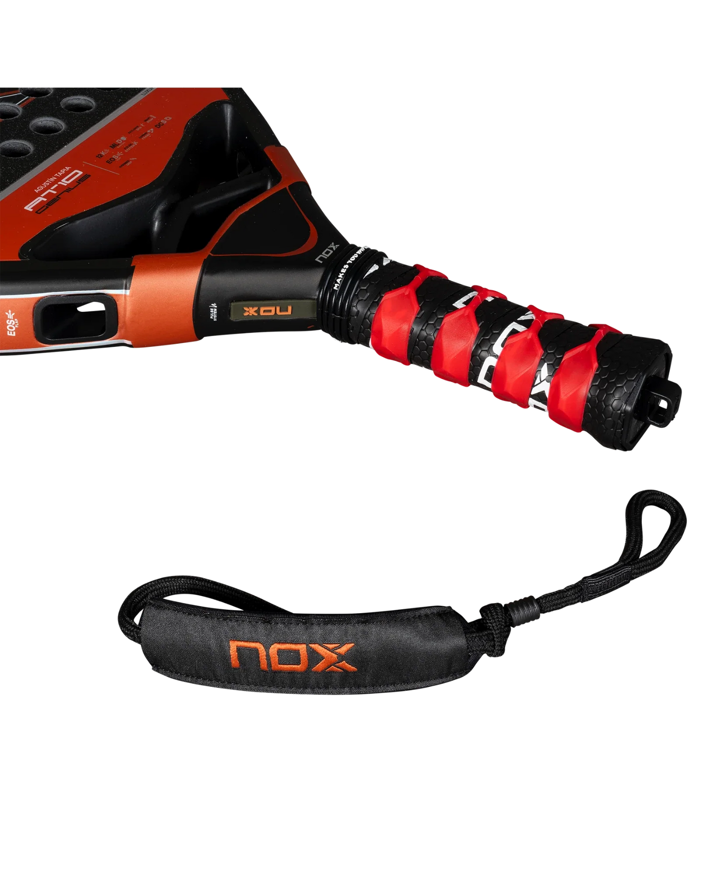 A close-up of the Nox AT10 Luxury GENIUS ATTACK 12K 2025 by Agustin Tapia from Padel USA shows its diamond-shaped handle with red and black grip tape, a black wrist strap with orange NOX branding, and EXCLUSIVE SPIN tech on a white background.