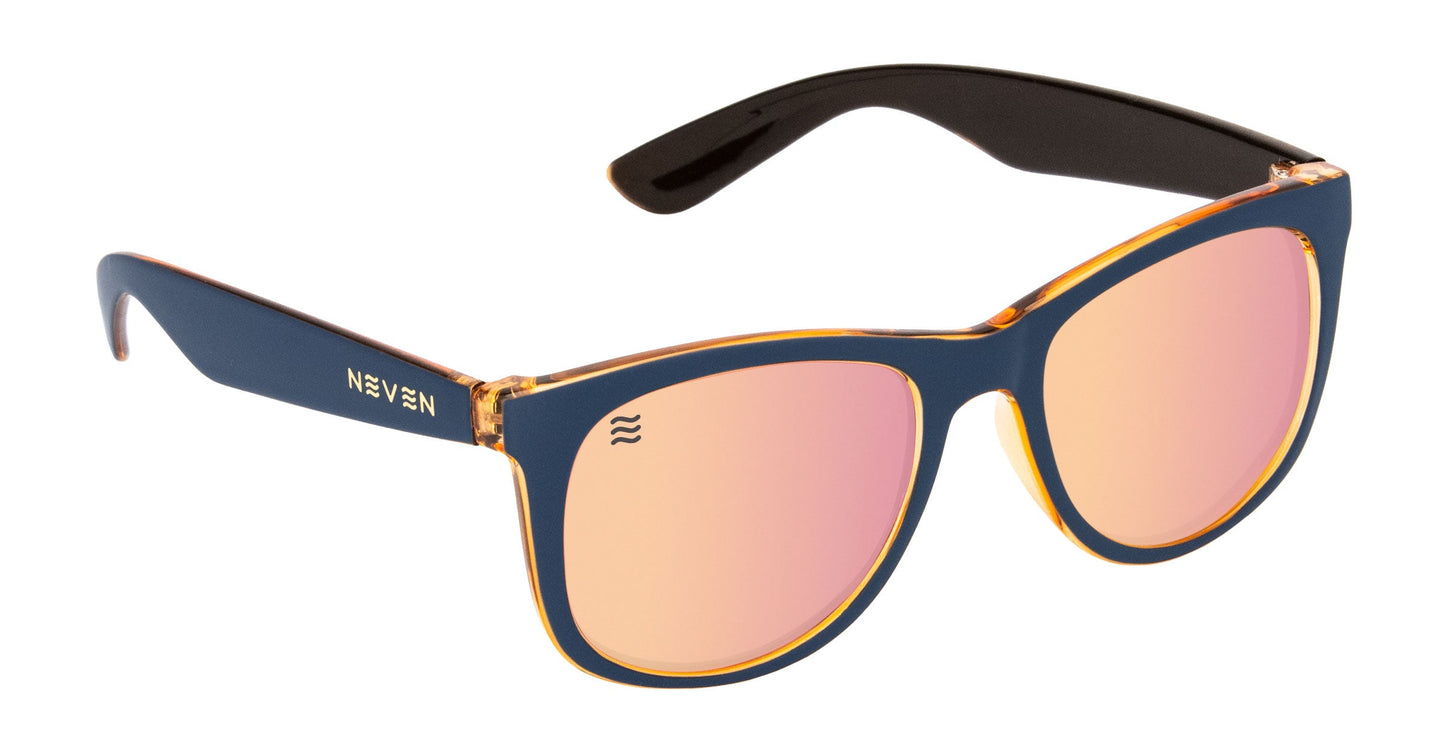 The Sundown by Neven Eyewear are polarized sunglasses with UV400 protection, a navy blue and amber tortoiseshell TR90 frame, black arms, pink mirrored lenses, white NEVEN branding on the left arm, and a white wave logo on the left lens.