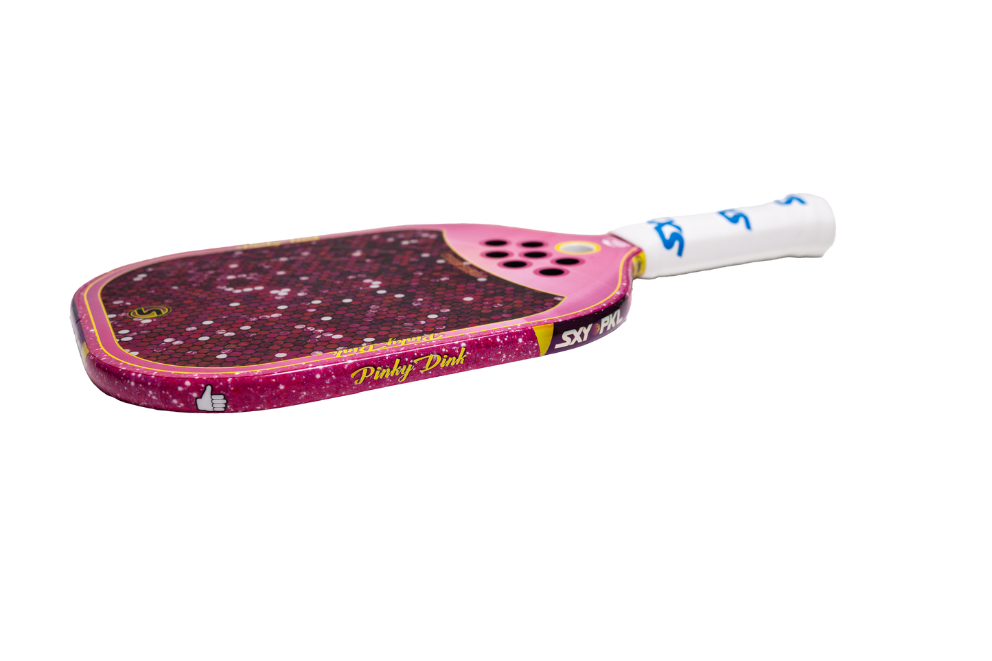 A close-up of the SEXY Brand SXY PKL Pinky Dink Pickleball Paddle shows its pink carbon fiber finish, pixelated pattern, white grip, and “Pinky Dink” text. A thumbs-up icon appears on the edge against a plain white background.