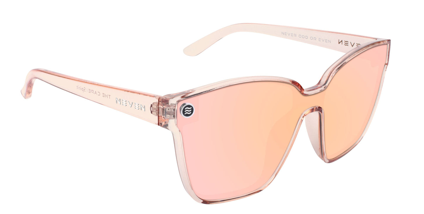 Neven Eyewear’s Spirit sunglasses feature oversized, translucent pink butterfly frames with pink gradient lenses. “NEVER ODD OR EVEN” is printed inside the arms, and a small round logo decorates the left lens.