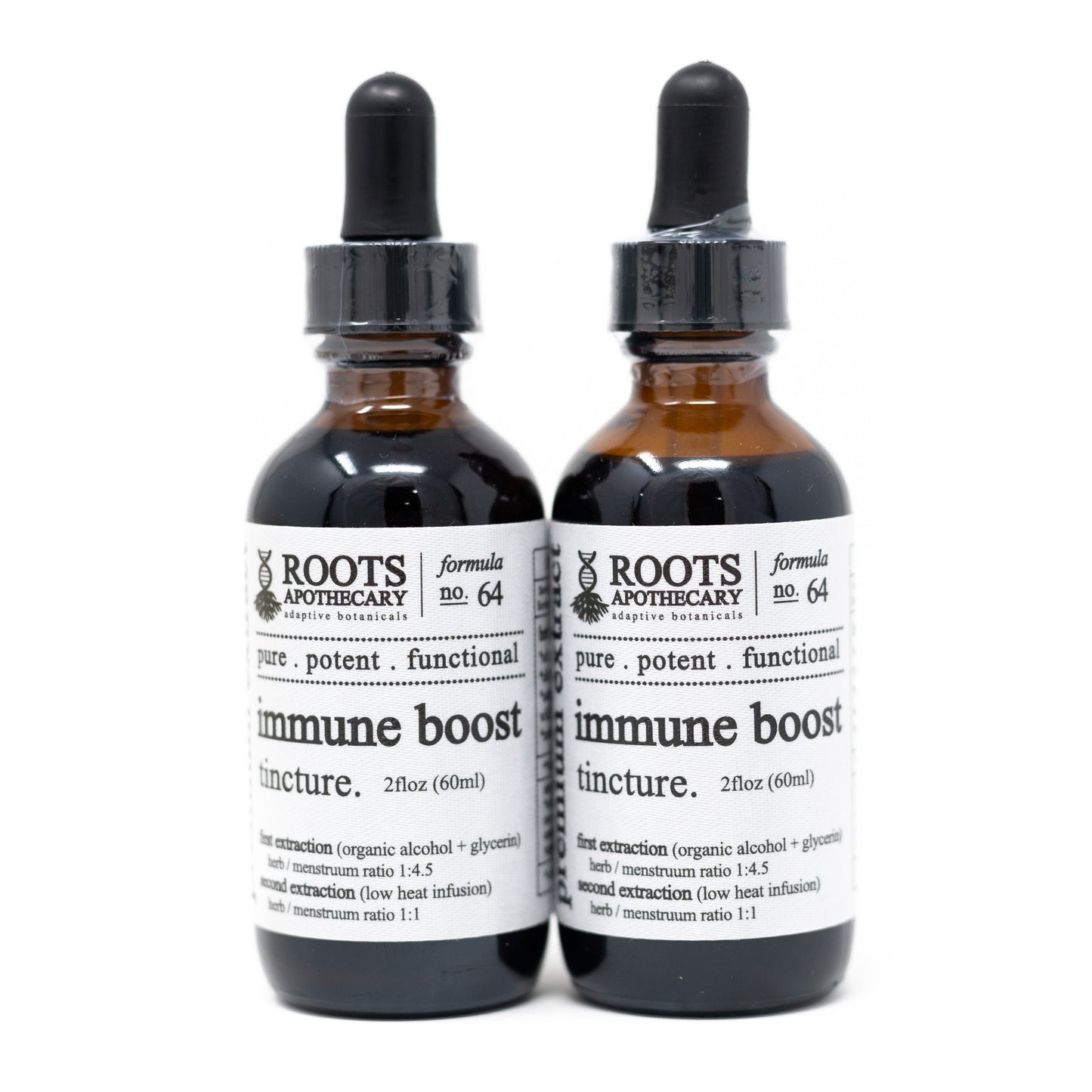 Two dark glass dropper bottles of Roots Apothecary Immune Boost Tincture stand side by side, each with a black dropper cap and a white label showcasing its potent herbal blend for immune support.