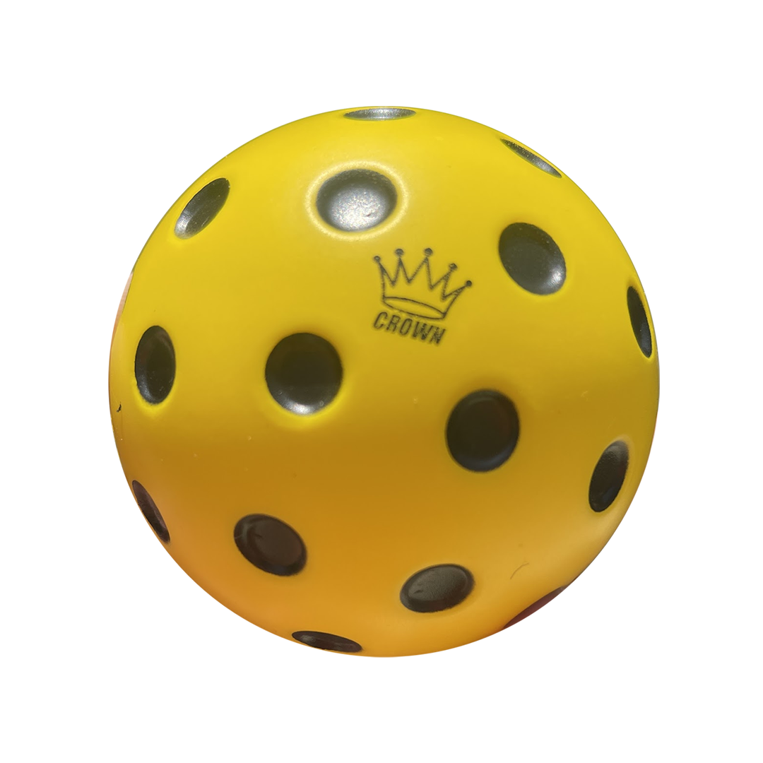 The CROWN PICKLEBALL - FLICKBALL™ Training Ball (YELLOW) by Crown Pickleball features a crown logo above the name, round holes for practice, and is ideal for boosting quick hands and reaction time. Shown on a plain white background.