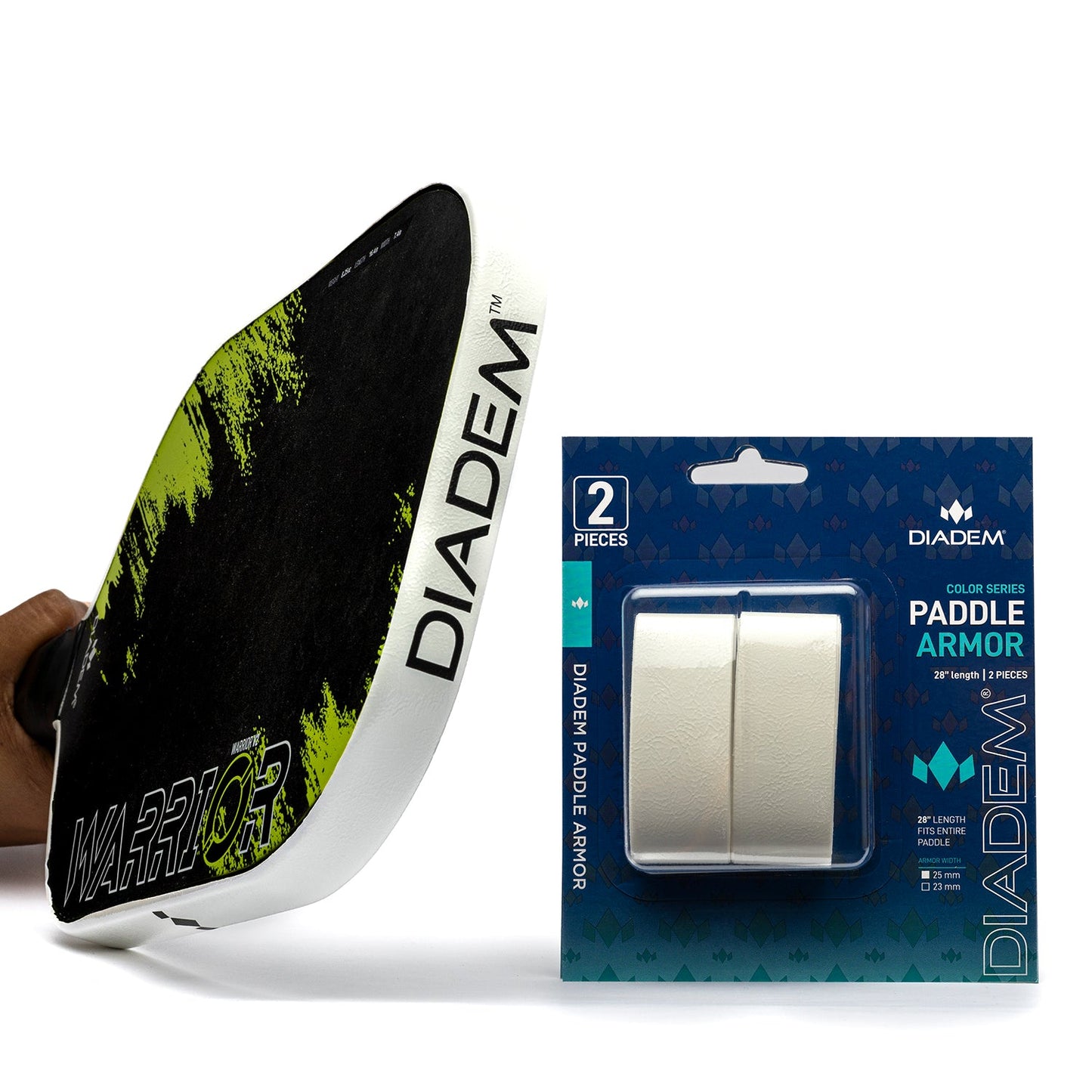 A hand holds a Diadem Warrior Edge pickleball paddle, featuring a black and green design with a white edge guard. Beside it is Diadem Sports' Paddle Armor—two white pickleball paddle protectors in blue and white packaging.