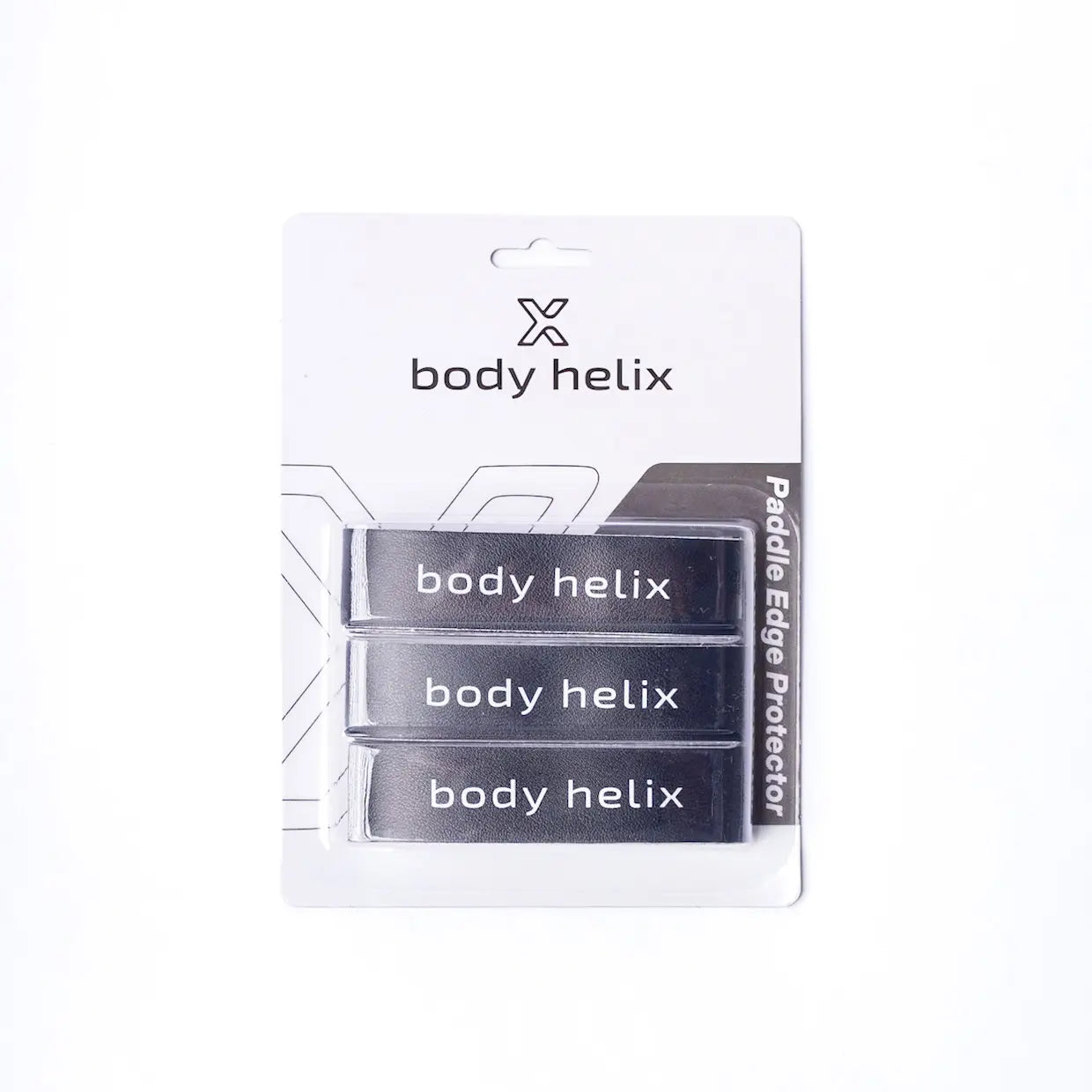 A retail package of body helix Pickleball Edge Guard Tape includes three black rectangular edge guards with "body helix" in white. The mostly white box has grey and black accents and a hang tab at the top.