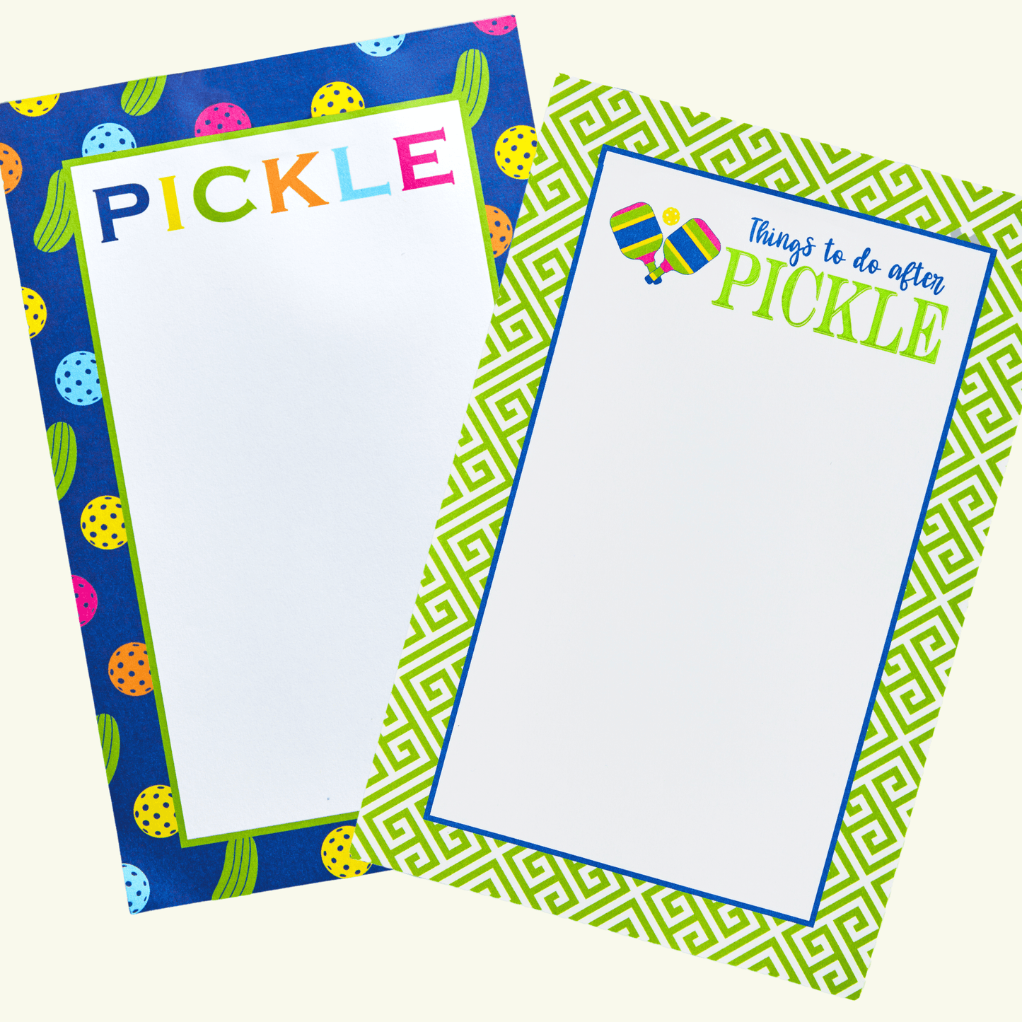 Fresh Pickle’s Pickleball Notepad features two colorful pads: one with a blue pickle border and “PICKLE” at the top, the other green with paddles and “Things to do after PICKLE.” Fun gifts for pickleball fans!.