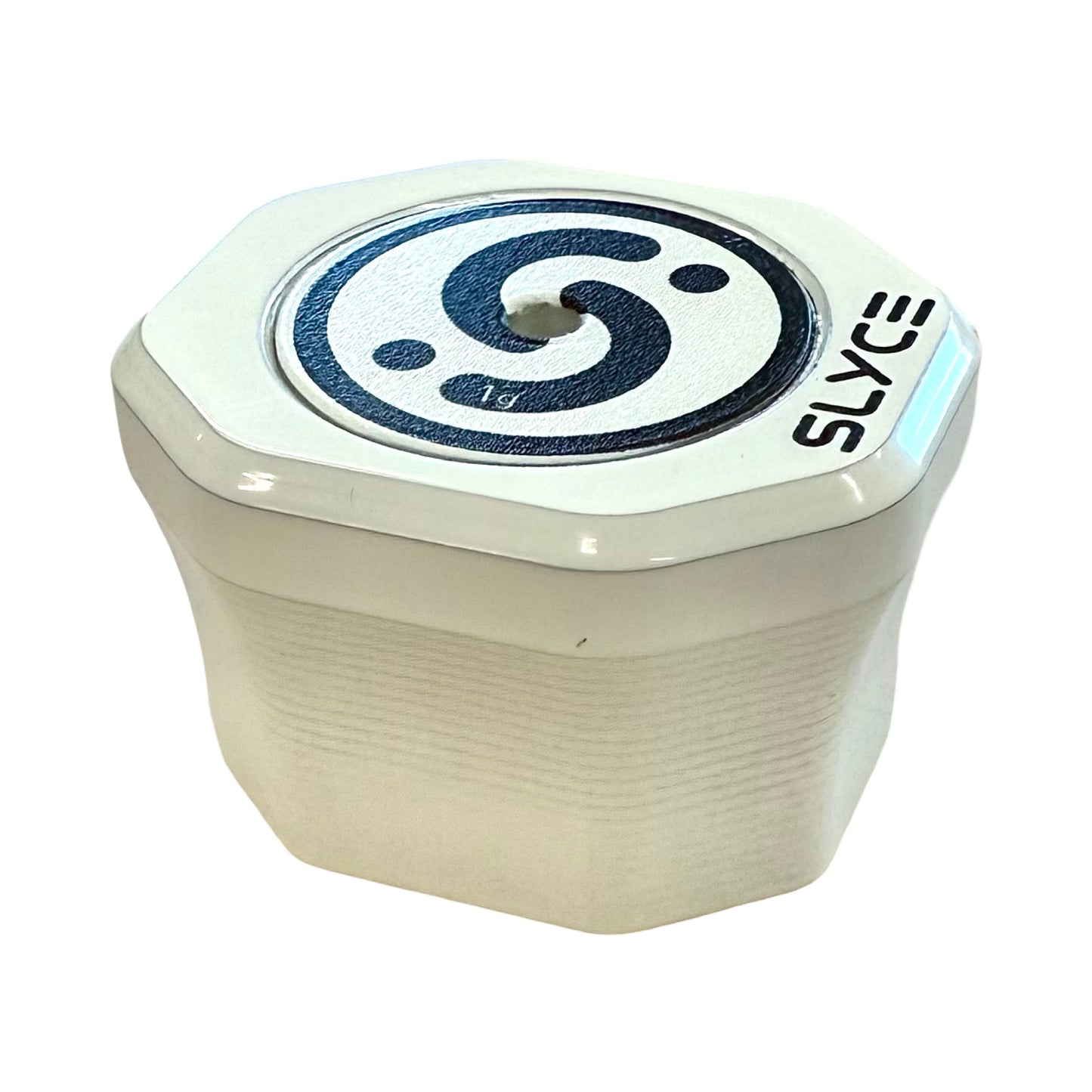 A white hexagonal container with a black-and-white “S” logo and “1g” on top, SLYCE printed on the lid. Perfect for storing the Slyce Sport Externally Adjustable Weighted SpeedCap (21g-36g) Paddle Performance Enhancer.