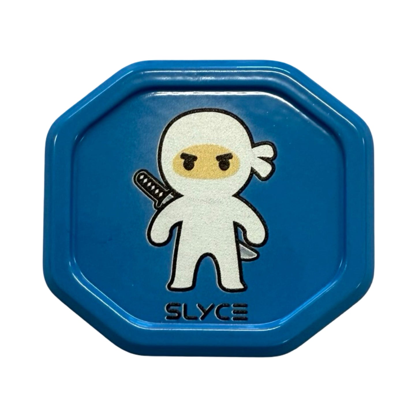 The Special Edition Dink Ninjas SpeedCaps by Slyce Sport feature a blue, octagonal design with a cartoon ninja in a white suit and "SLYCE" below, symbolizing paddle performance and precision inspired by 6061 aircraft aluminum.