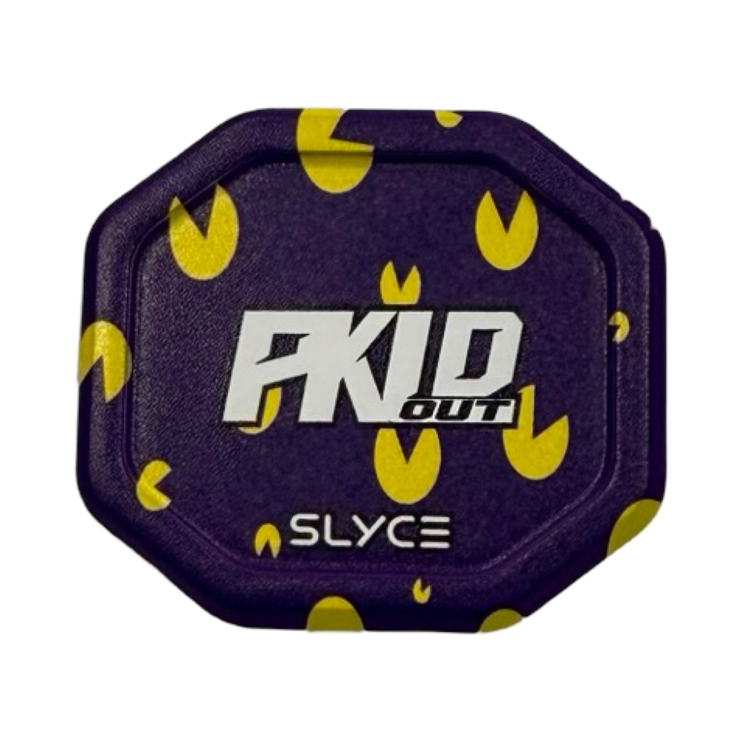 A purple, rounded square container with yellow abstract accents. “PKLDOUT” is centered in bold white and black, with a small yellow “OUT” below. “Slyce Sport” appears at the bottom—ideal as a Special Edition PKLDOUT Pacmann SpeedCap paddle enhancer (28g).