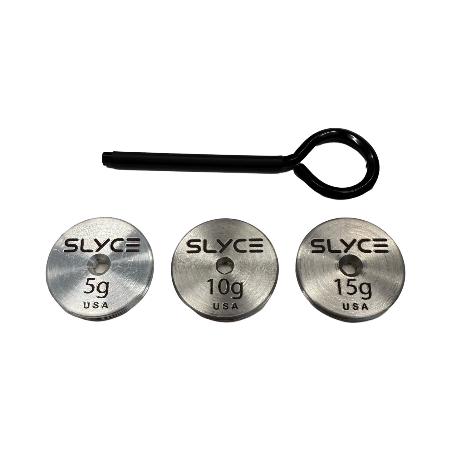 A black metal tool with a circular handle rests above three round, threaded silver discs (5g, 10g, 15g), each engraved "SLYCE USA", from the Slyce Sport SpeedCap Adjustable Weight Kit, arranged in a row on a white background.