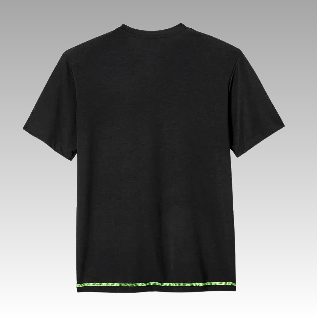 The image shows the Warrior Tee by Playly Store from the back, a plain black short-sleeve shirt on a gray gradient background. It features moisture-wicking fabric and a subtle neon green stitched line along the bottom hem, with no visible logos or patterns.