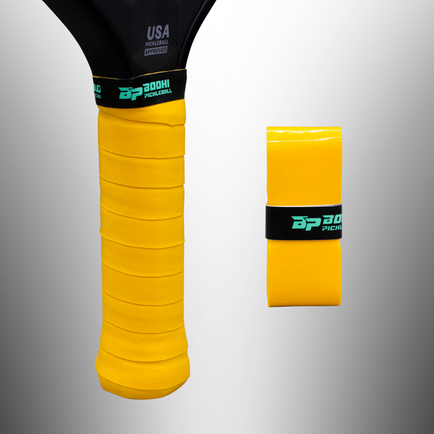 A close-up shows a pickleball paddle handle wrapped in a PROtack™ Premium Pickleball Overgrip by Bodhi Performance, with an unused matching overgrip beside it. Both have black bands with teal BP 300H1 PICKLEBALL text on a gradient gray background.