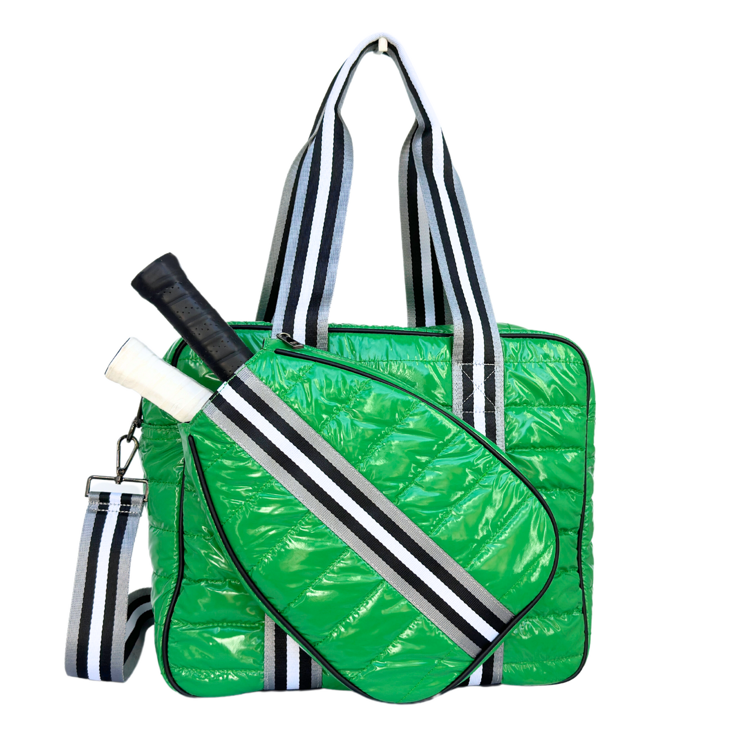 The Queen of the Court Kelsey Pickleball Bag is a shiny green quilted bag with black and white striped handles and strap, plus a matching racquet-shaped pocket holding a racket with a black grip for a sporty, modern look.