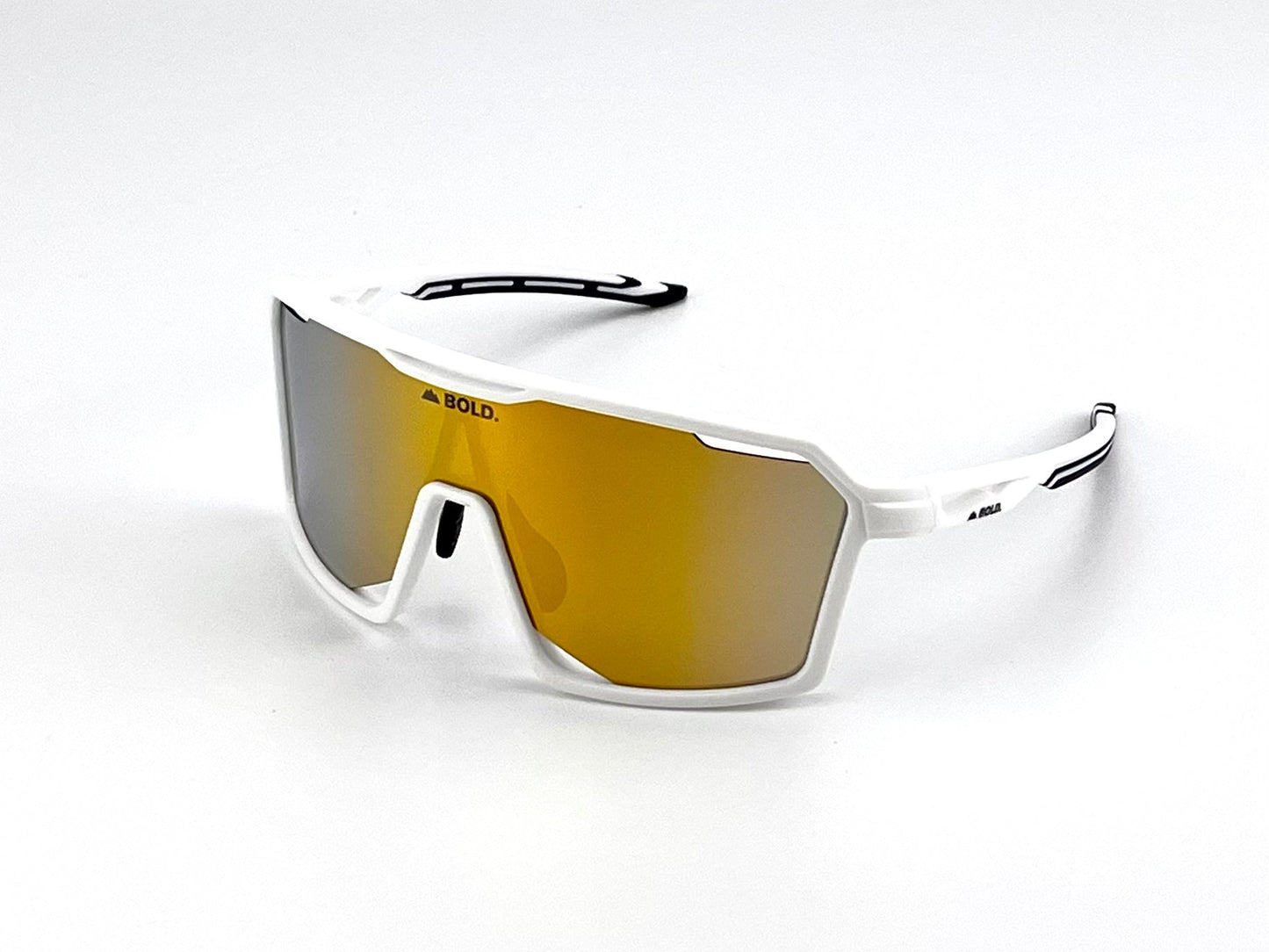 The BOLD Flux Performance Sunglasses by boldouterwear feature white frames, large angular gold-mirrored lenses with "BOLD." on the top left, black-detailed temples, and UV protection—perfect for MTB, ski, and lifestyle wear. Shown on a white background.