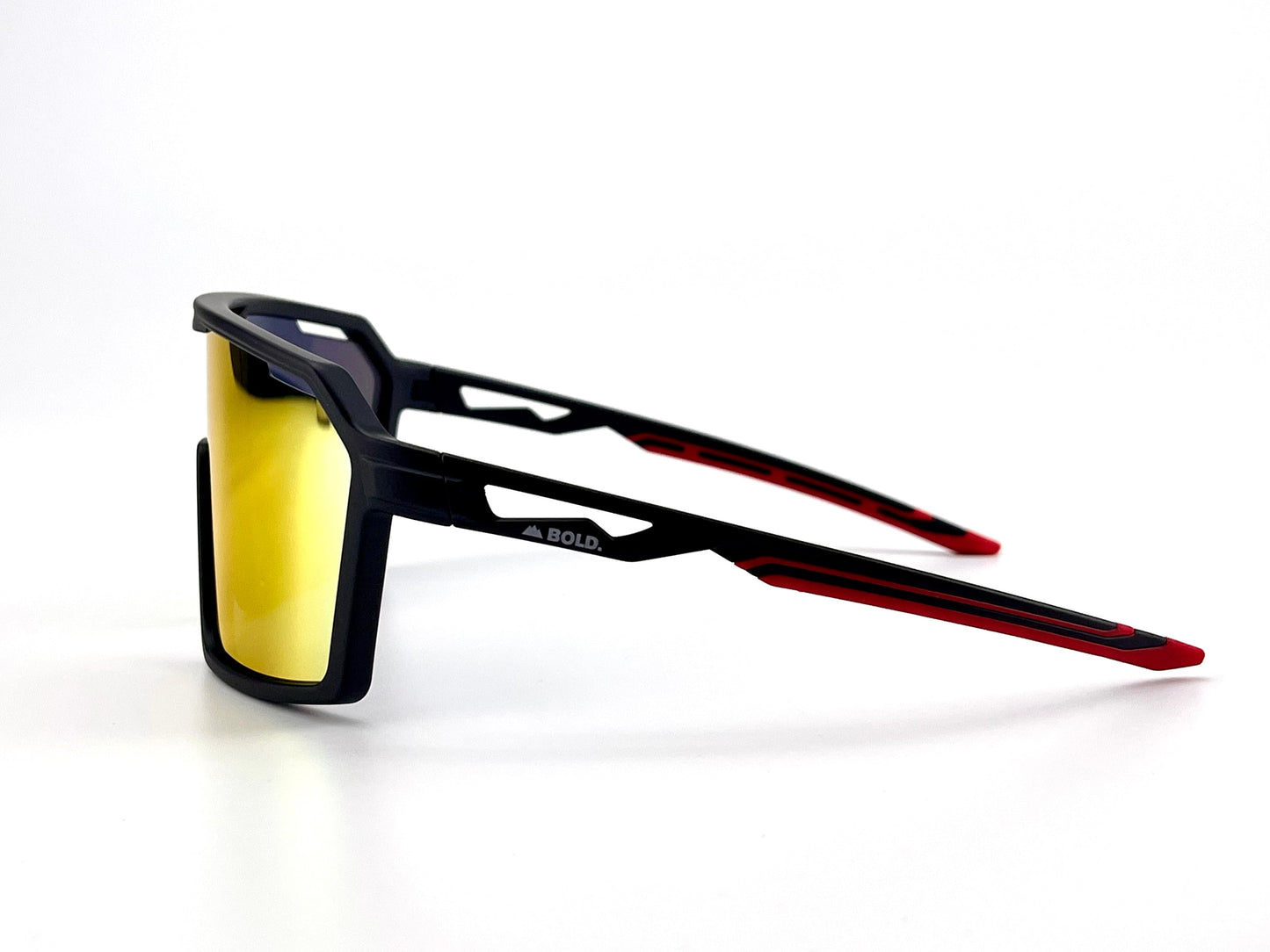The BOLD Flux Performance Sunglasses by boldouterwear feature black frames, bold yellow mirrored rectangular lenses, red and black angular arms with "BOLD" on the left temple, and deliver modern UV protection—perfect for MTB, ski & lifestyle activities.