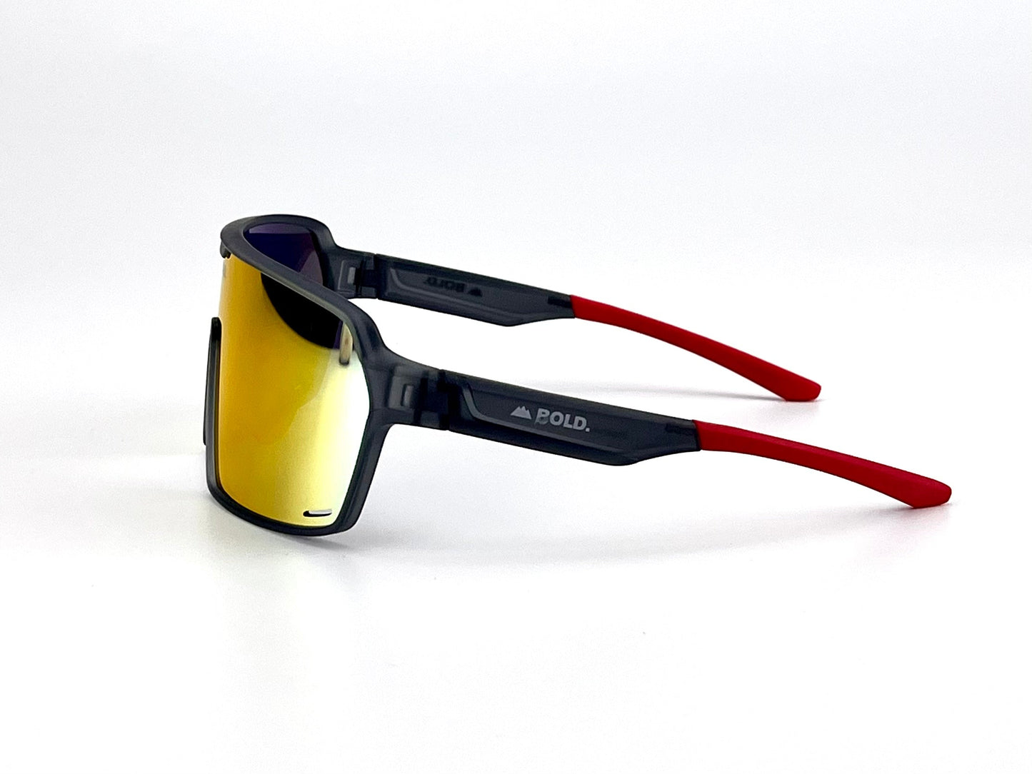 BOLD Shadows Performance Sunglasses by boldouterwear feature yellow mirrored square lenses, dark gray translucent frames, and bright red arms with the brand printed on the side, shown against a plain white background.