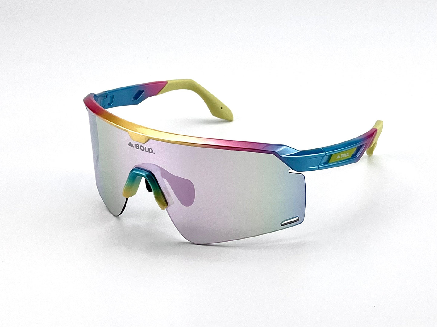 The BOLD Bearclaw Performance Sunglasses by boldouterwear feature a sporty oversized mirrored lens, frameless design, and blue-pink-yellow gradient. "BOLD." is printed on the lens and arm—ideal MTB, ski & active lifestyle eyewear.