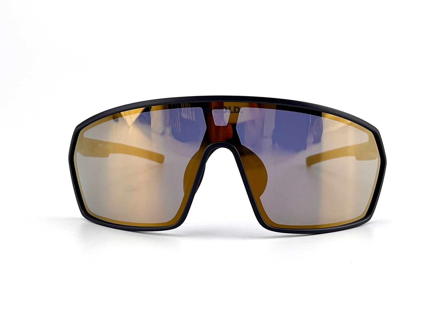 The BOLD NSP Performance Sunglasses by boldouterwear feature a black frame and large amber-tinted wraparound lenses, designed for MTB, ski, and lifestyle use—offering wide coverage ideal for smaller faces. Photographed on a plain white background.