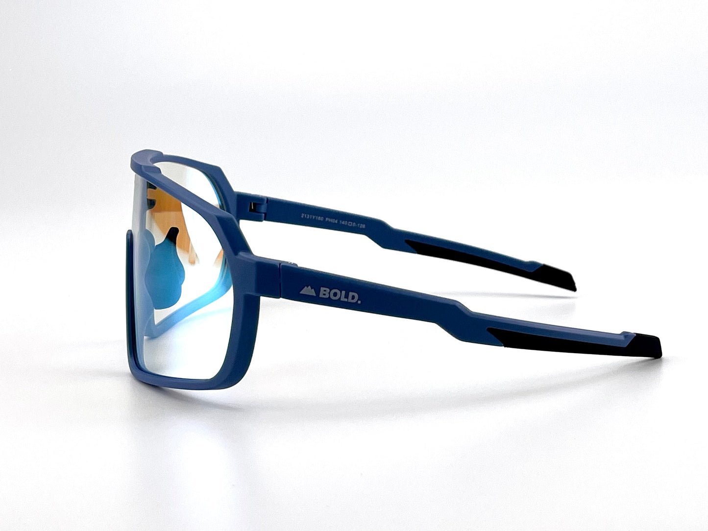 The BOLD Slayers Photochromic Sunglasses by boldouterwear feature blue mirrored lenses, thick frames, and black-accented arms with the brand name printed in white, all set against a plain white background highlighting their modern style.