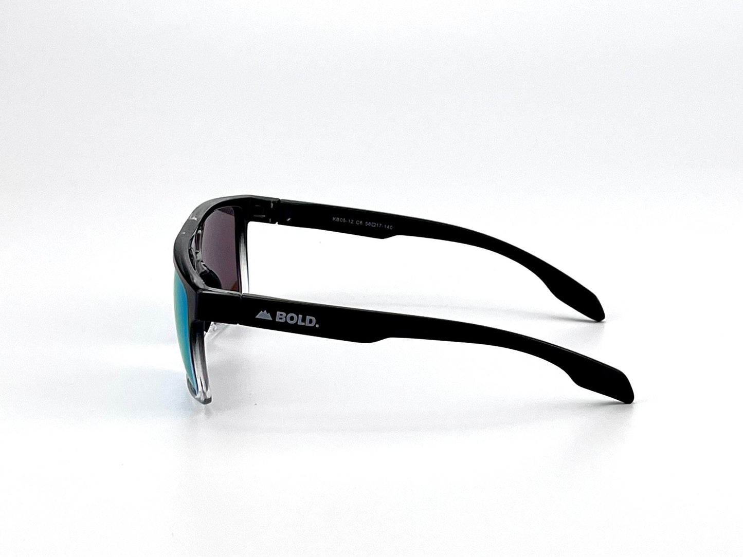 The BOLD Wildhorse Performance Sunglasses by boldouterwear are shown in side view with black, thick frames and slightly reflective blue-tinted lenses, featuring a white "BOLD." logo and mountain graphic—ideal for MTB, ski, and lifestyle wear.