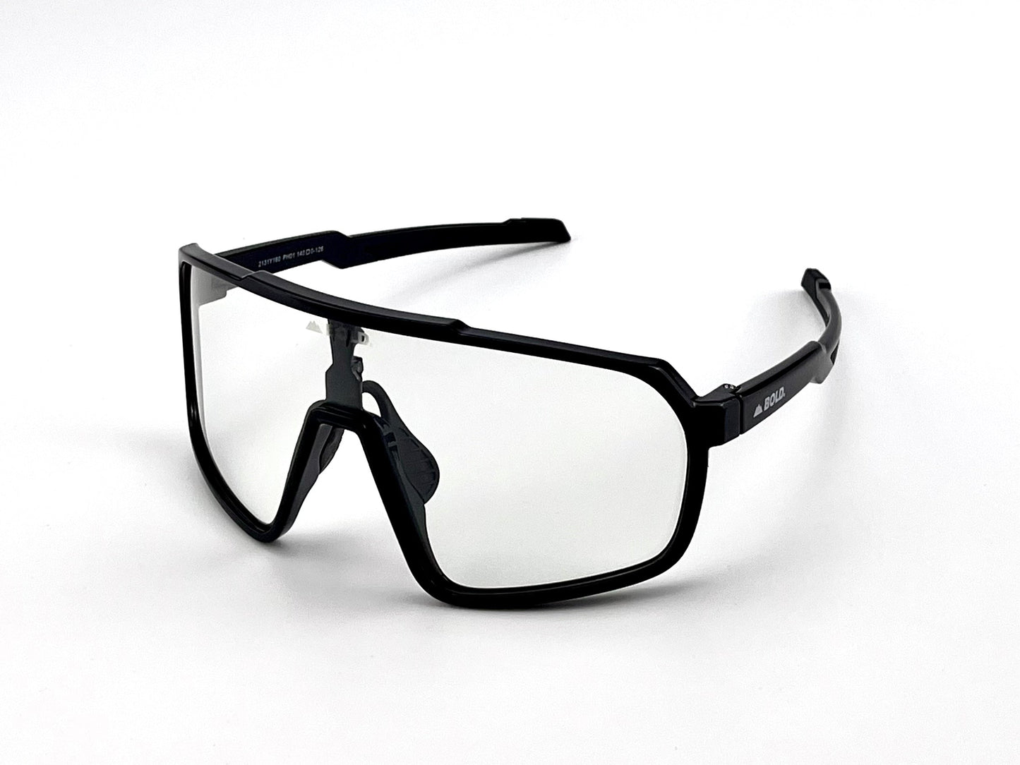 The BOLD Slayers Photochromic Sunglasses by boldouterwear feature a modern black-rimmed design with a single continuous photochromic lens, straight brow bar, and built-in nose pads, perfect for MTB, ski, and lifestyle use.