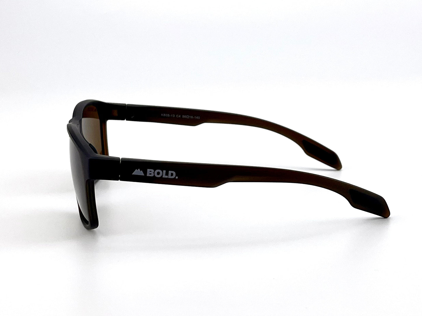 The BOLD Thunderhead Performance Sunglasses by boldouterwear feature dark brown rectangular lenses, thick arms, and a white "BOLD." with mountain icon on the arm. Side view photo; plain white background.