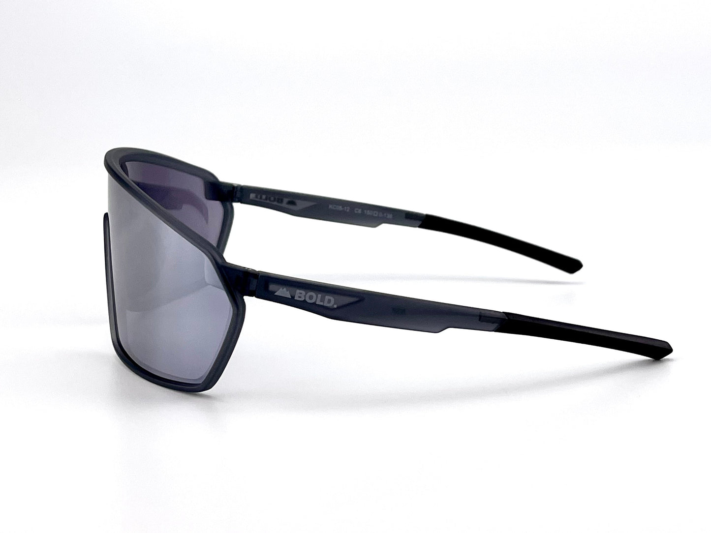 The BOLD NSP Performance Sunglasses by boldouterwear are shown in side view with a sleek black wraparound frame, mirrored lenses, and "BOLD" printed in white on the arm near the hinge against a white background.