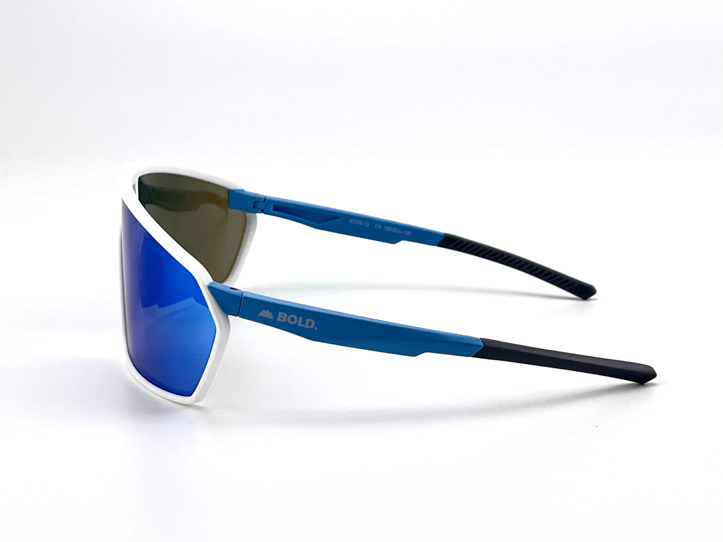 The BOLD NSP Performance Sunglasses by boldouterwear feature blue mirrored lenses, a white frame, and blue arms with black tips. Designed for smaller faces, they offer wraparound coverage and display "BOLD." plus a mountain logo on the left arm.