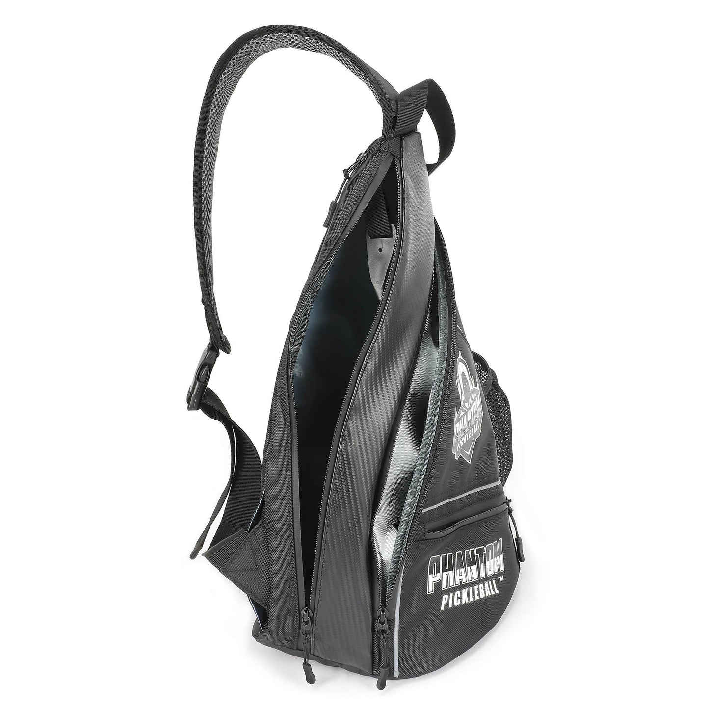 The Phantom Pickleball Sling Bag by Phantom Pickleball stands upright unzipped, displaying a spacious main compartment, mesh strap and side pockets, plus silver zippers with black pull tabs—ideal for carrying sports and pickleball gear.