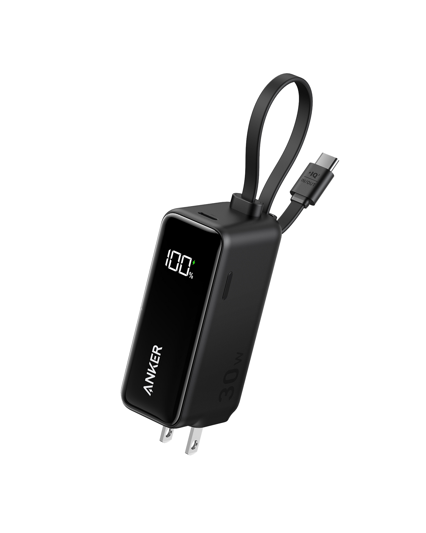 The Anker Power Bank (30W, 5k, Fusion, Built-In USB-C Cable) in black shows 100% on its display. It has foldable prongs, an attached short USB-C cable, and a looped strap, all set against a light gray background.