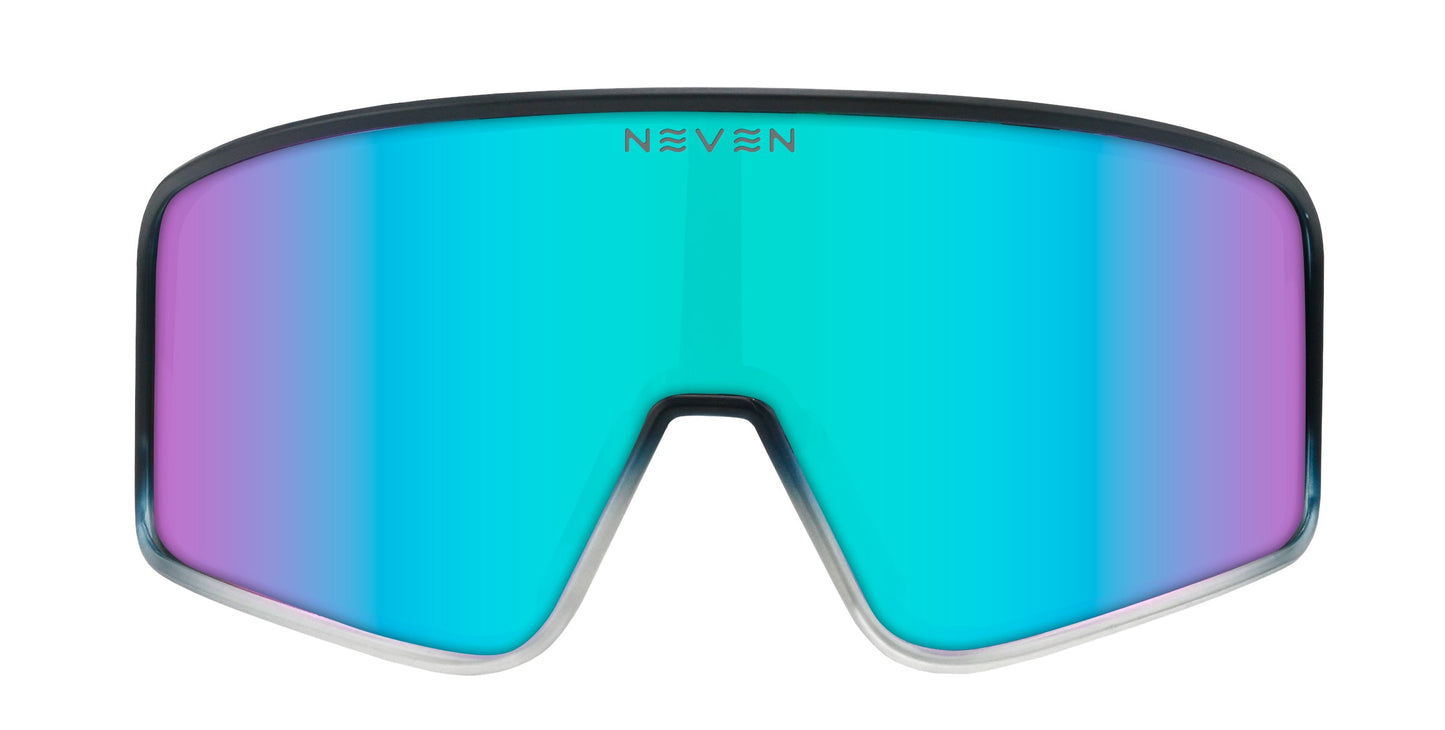 The G.O.A.T by Neven Eyewear are large, frameless sunglasses with a teal and purple gradient polarized UV400 lens. Featuring impact resistance, thin black edges, and NEVEN printed top center.